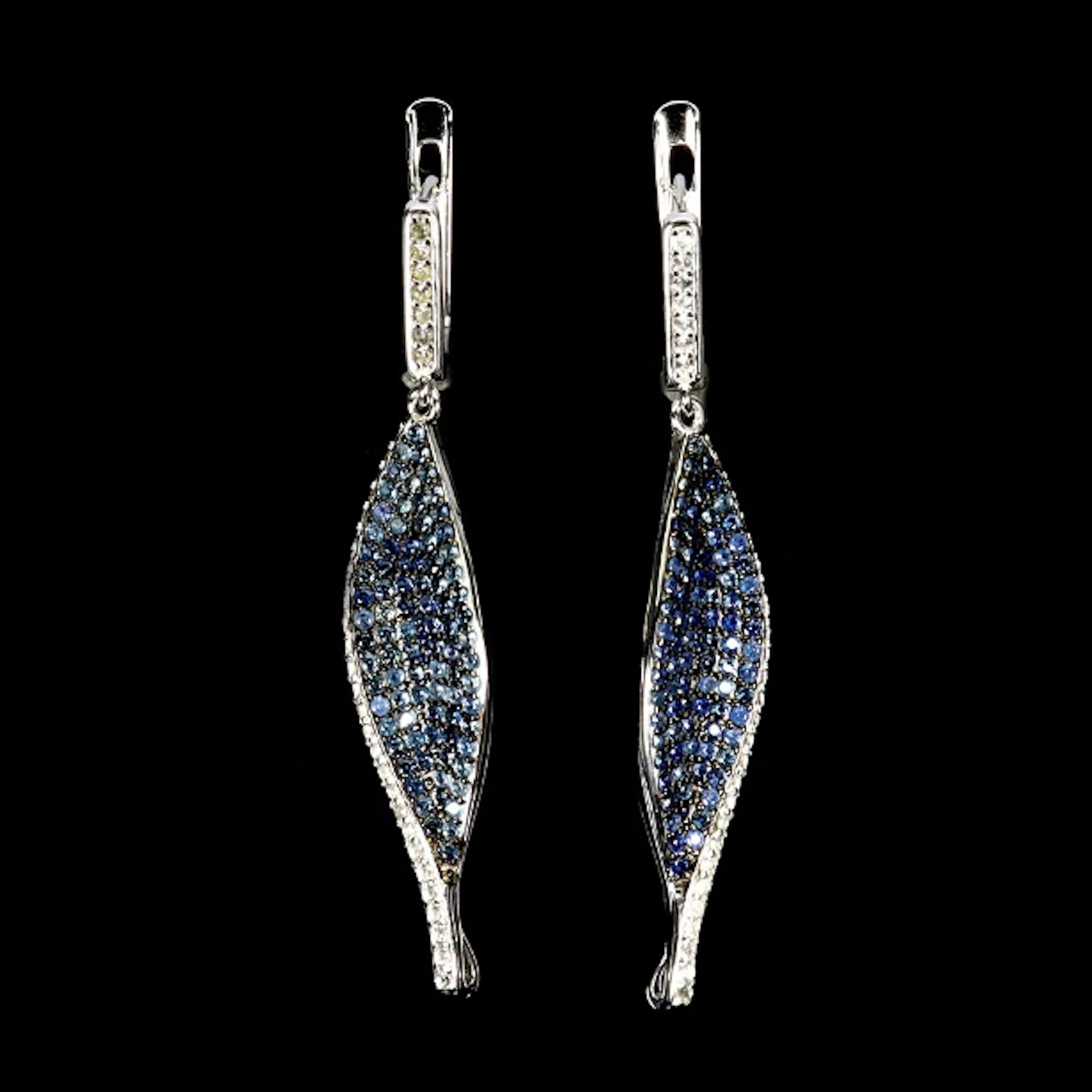 Earrings. Rhodium-plated sterling silver with sapphires and topazes.