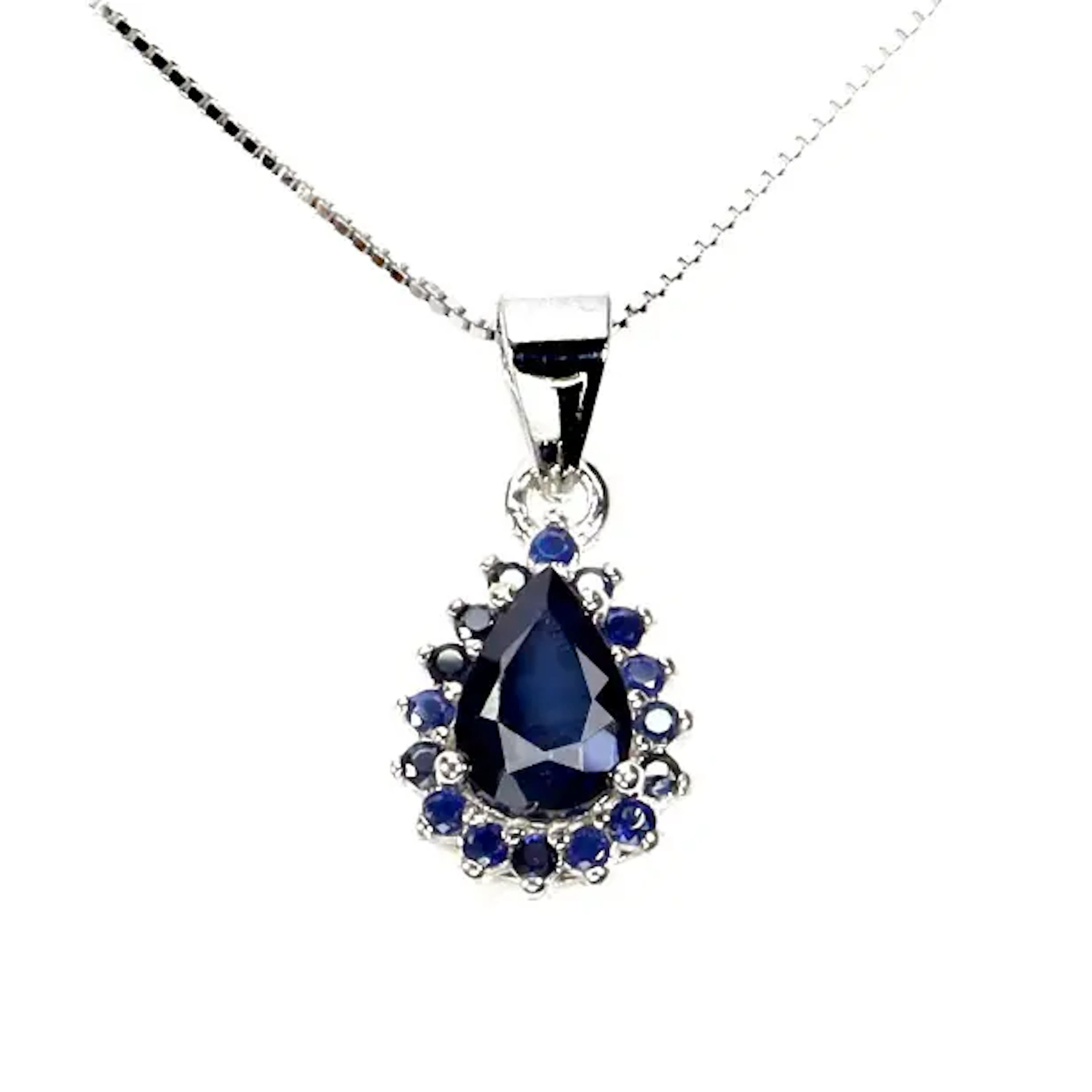 Pendant in rhodium-plated Sterling silver, adorned with blue sapphires