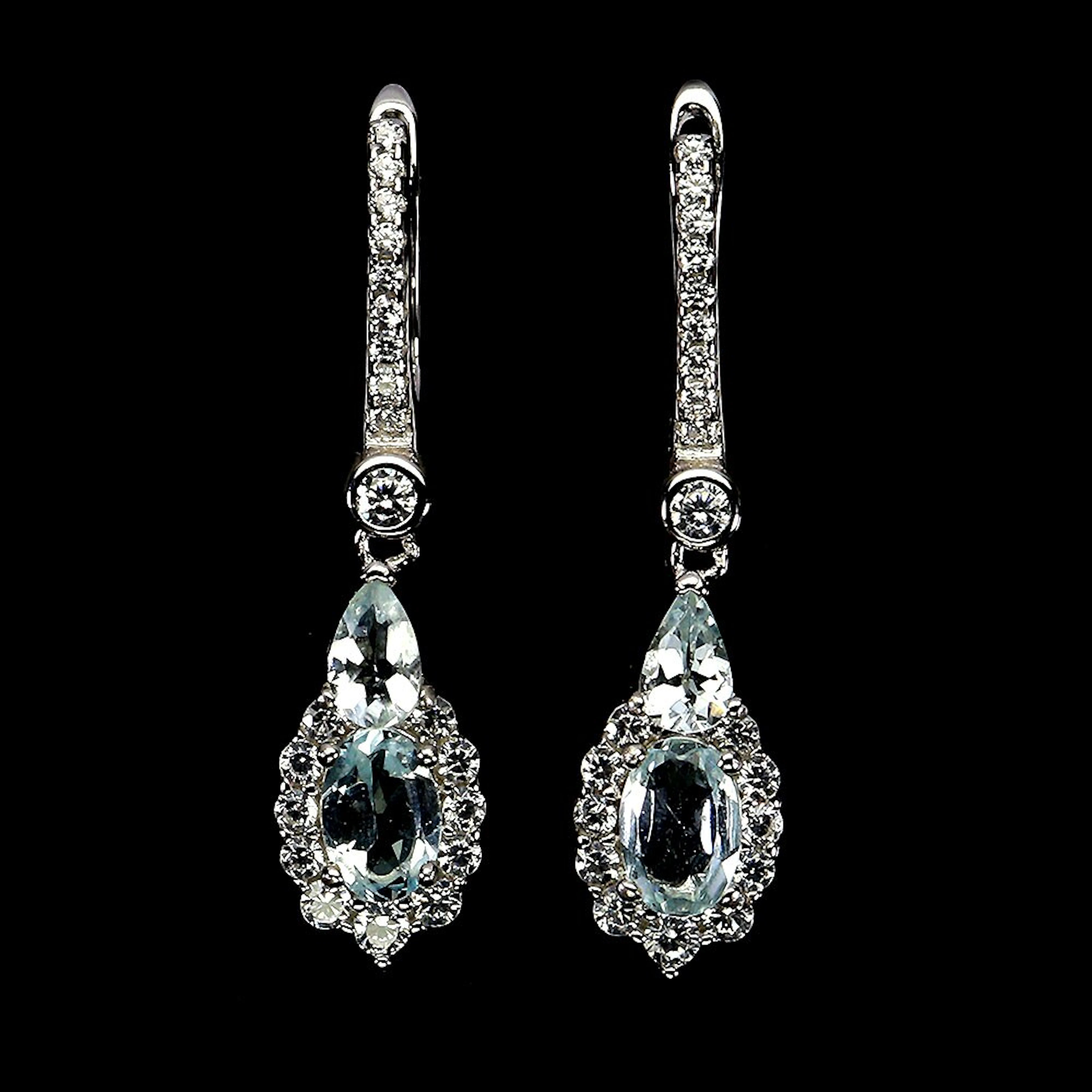 Earrings in rhodium-plated Sterling silver with aquamarines and cubic zirconias