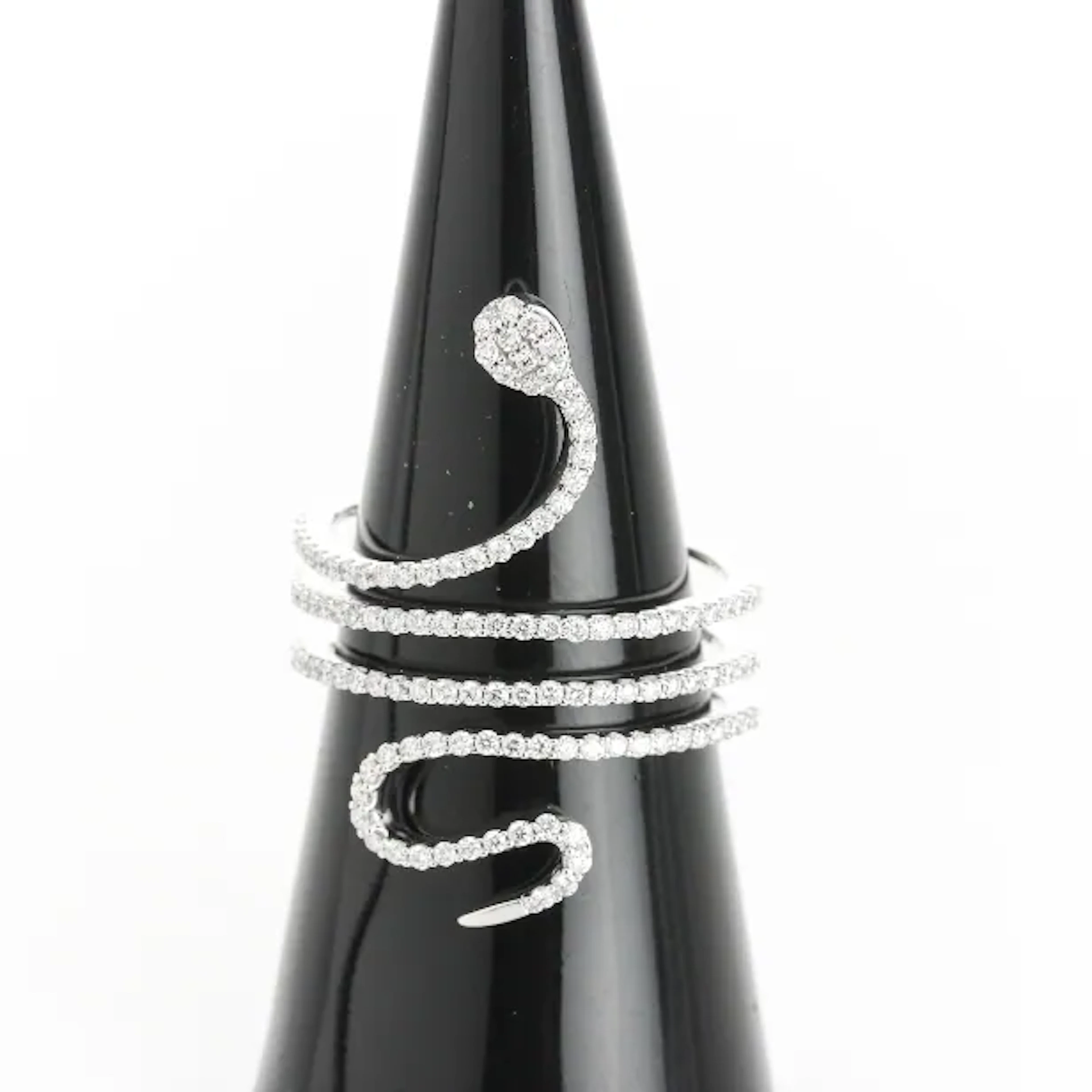 Snake ring of 14 kt. white gold with diamonds, total approx. 0.63 ct.
