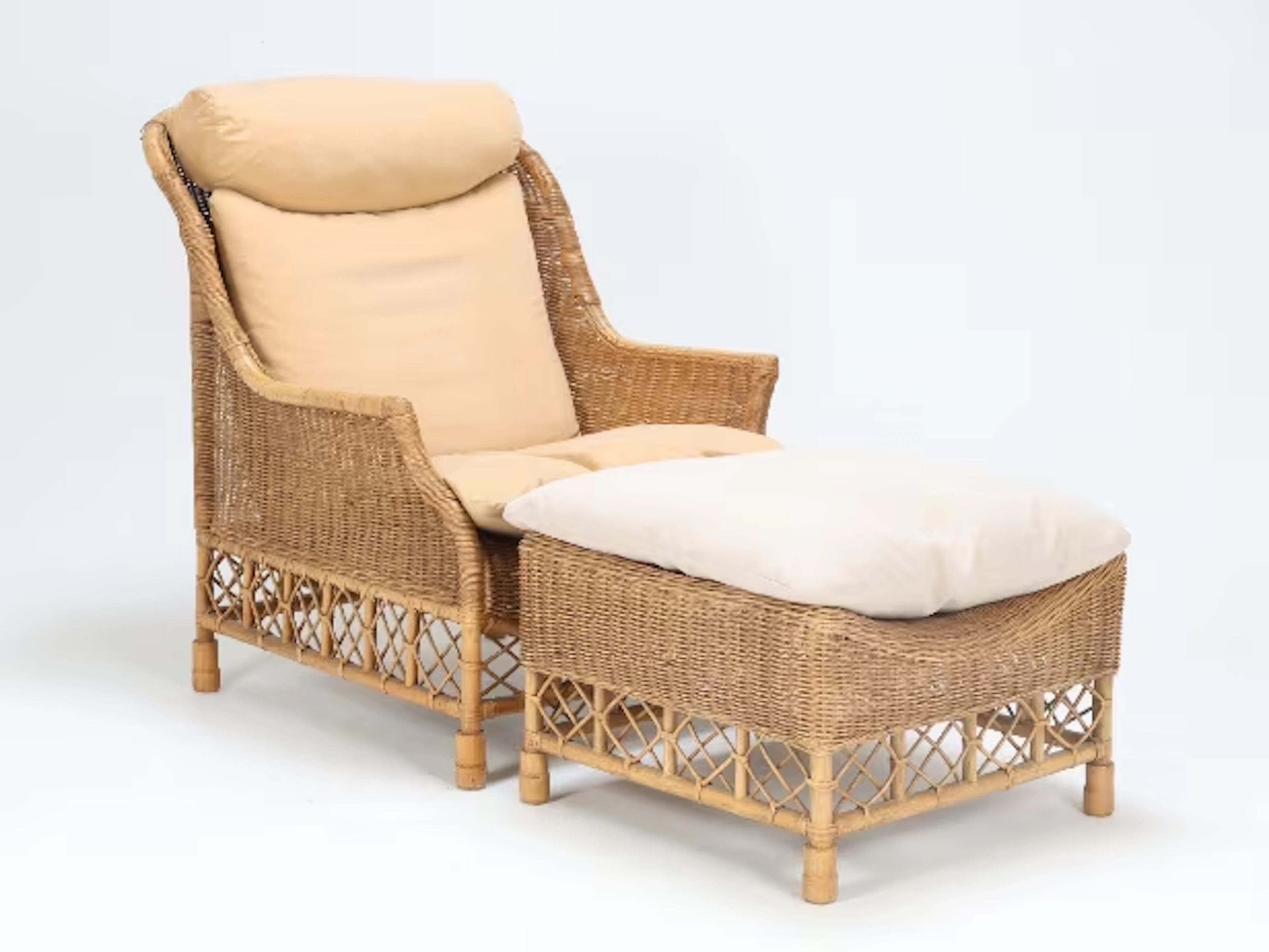 'Karen Blixen' armchair and stool made of woven natural rattan. (2)