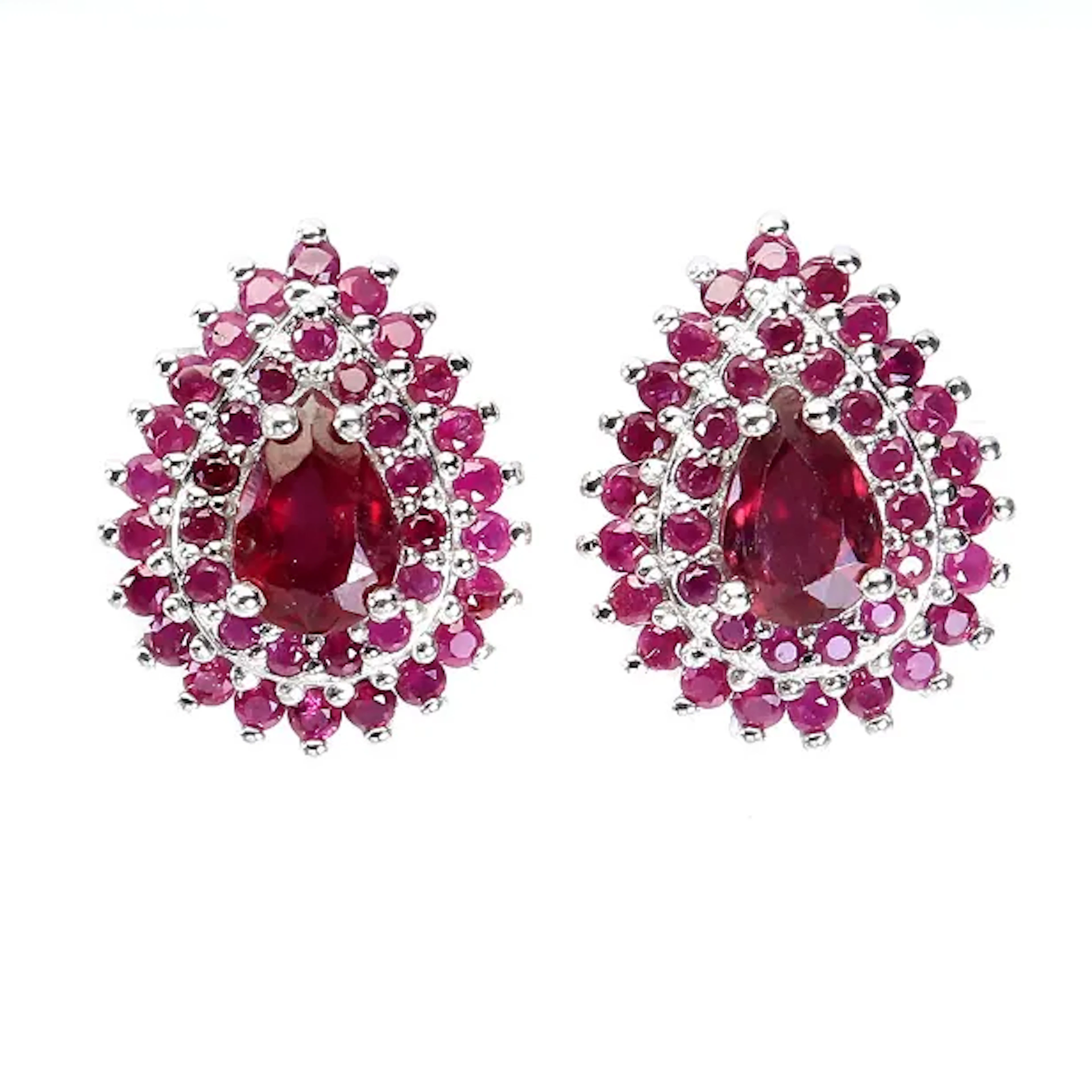Earrings in rhodium-plated sterling silver adorned with two rubies