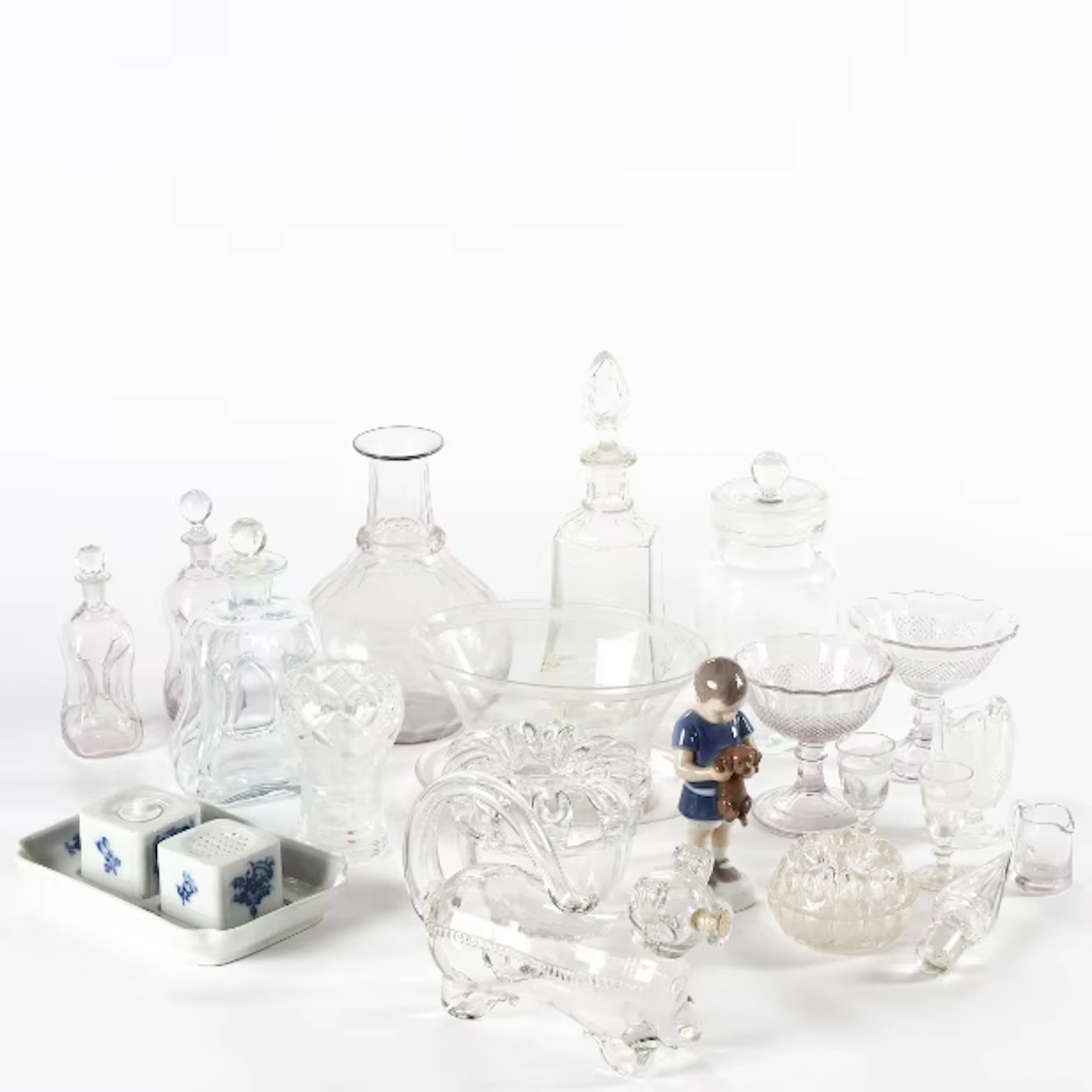 A collection of various glasses, a schnapps dog and a Royal Copenhagen