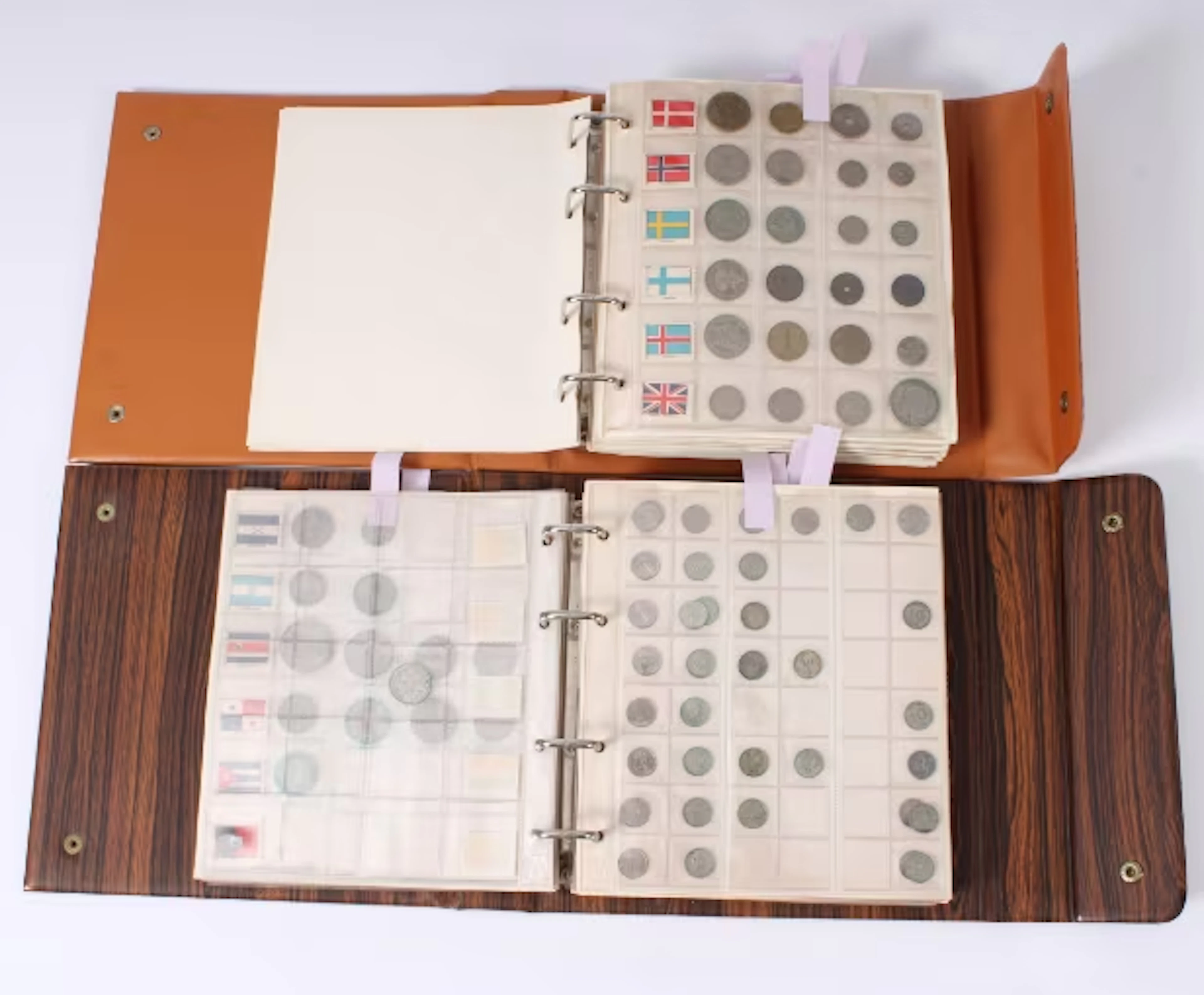 Collection of coins from all over the world in 2 albums. Some Norway