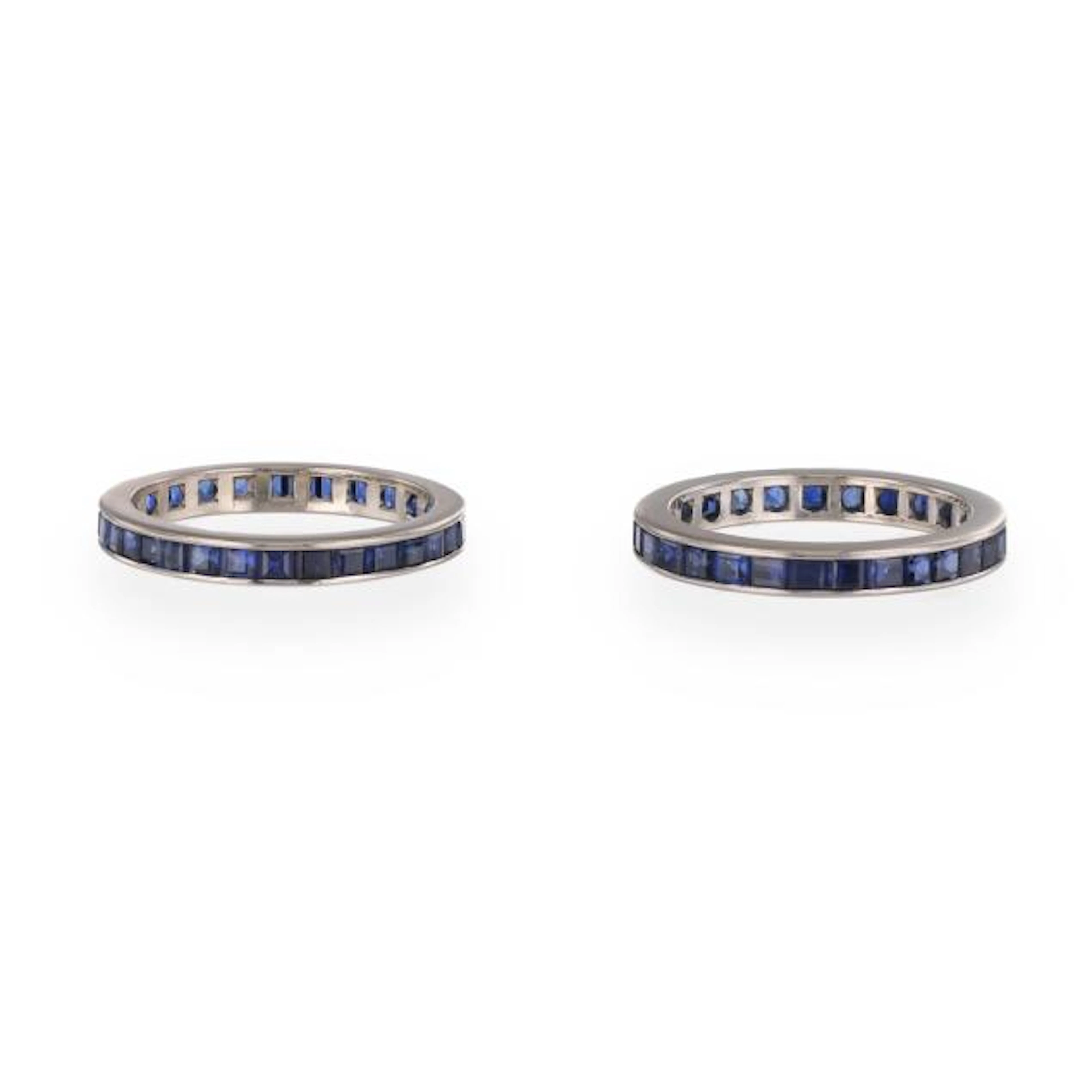 Pair of White Gold and Synthetic Sapphire Eternity Bands