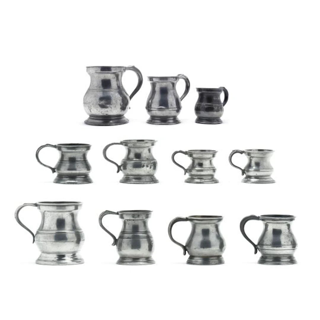 A Collection of Eleven Antique British Pewter Measures