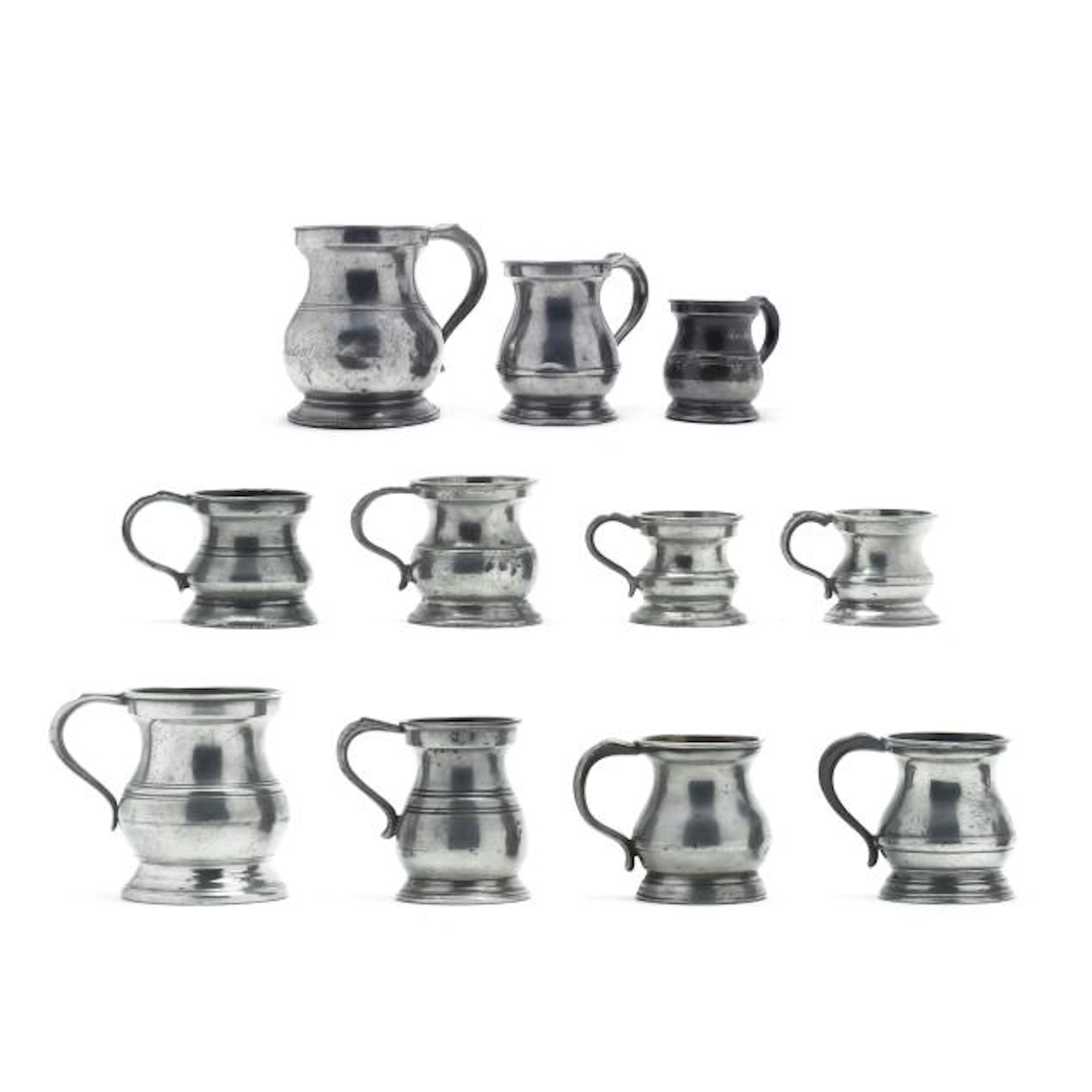 A Collection of Eleven Antique British Pewter Measures