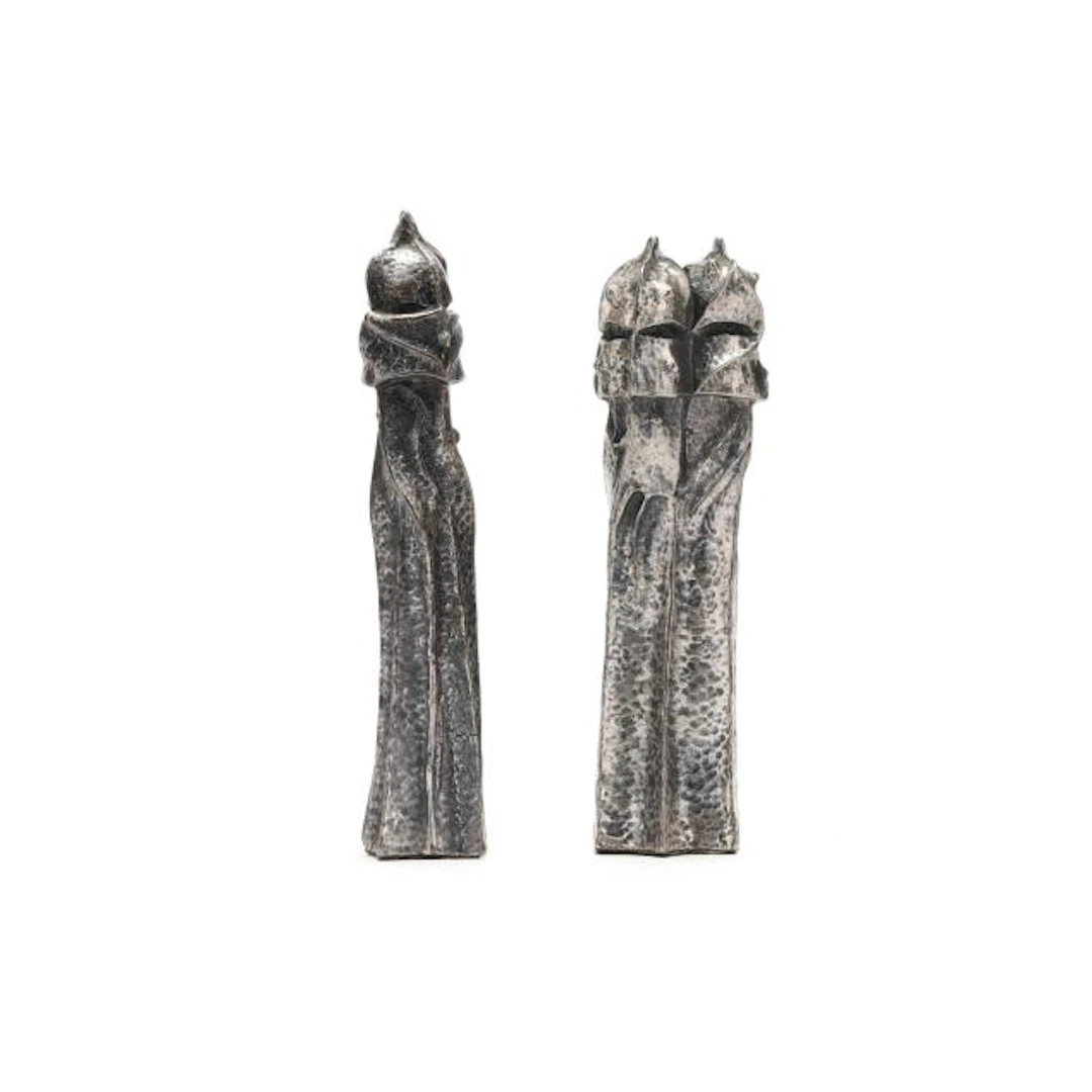 After Antoni Gaudi (Spanish 1852-1926), Two Silver-Plated "Warrior"
