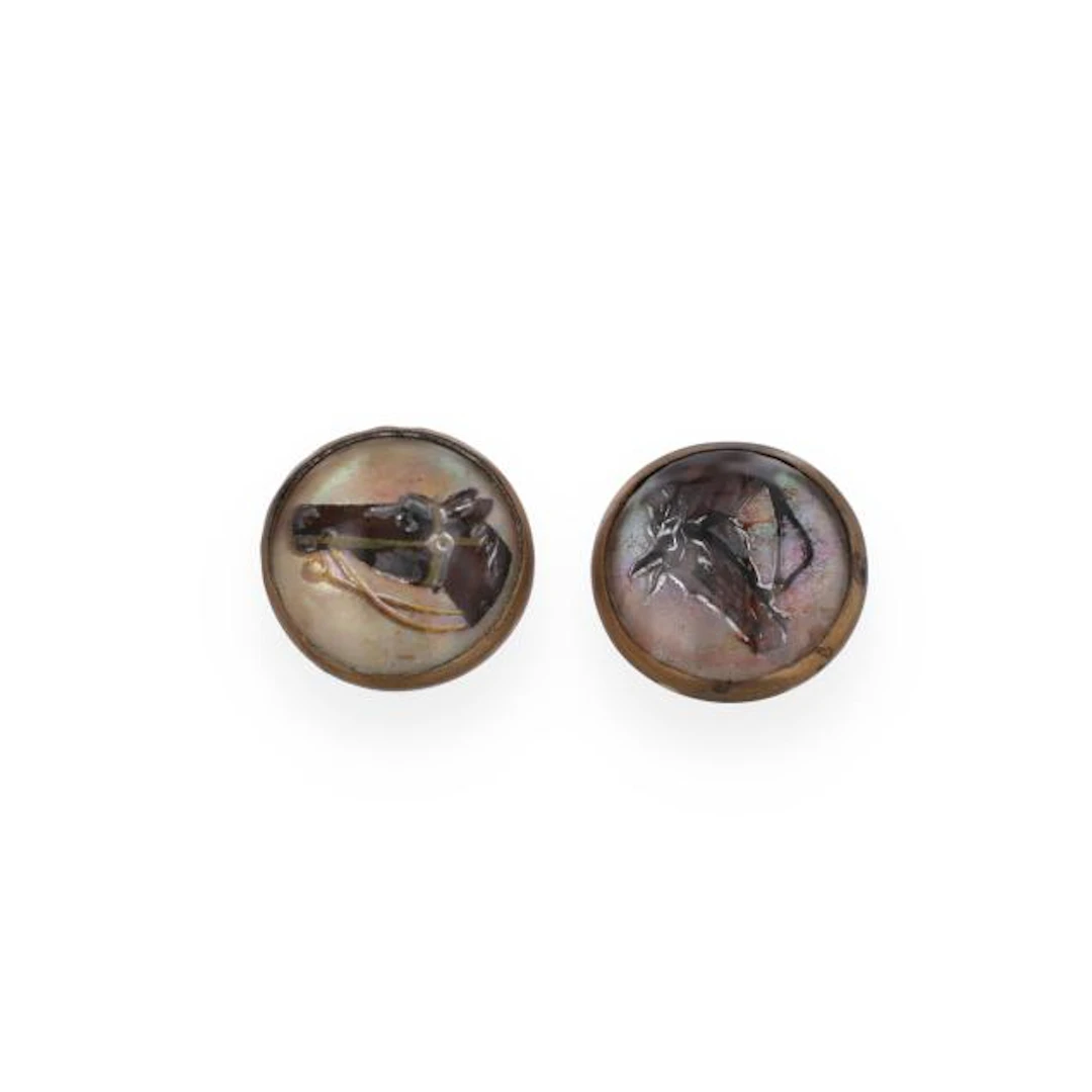 A Pair of Vintage Reverse Crystal Intaglio Horse Motif Buttons