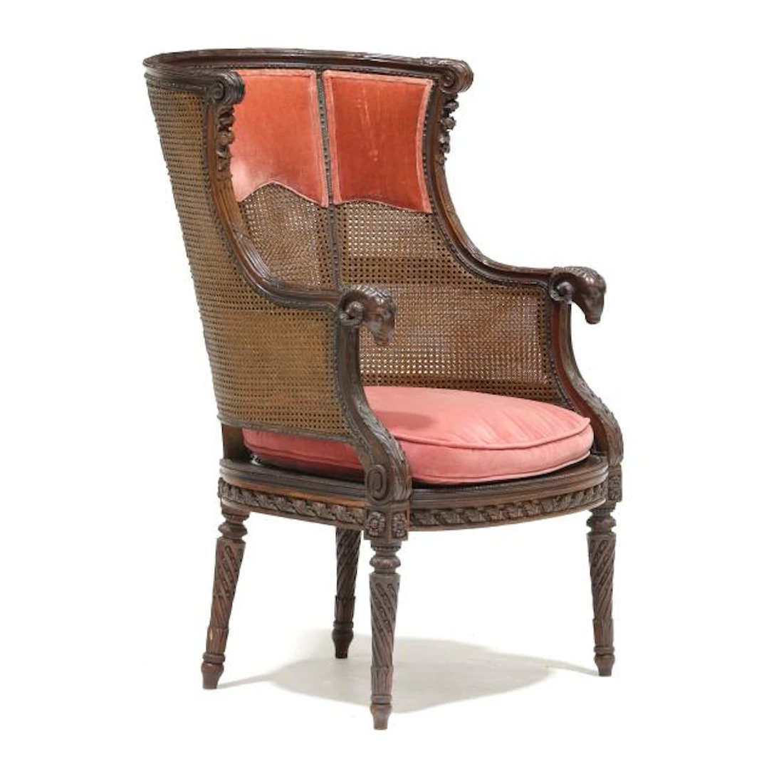 Louis XVI Carved Walnut Cane Back Bergere