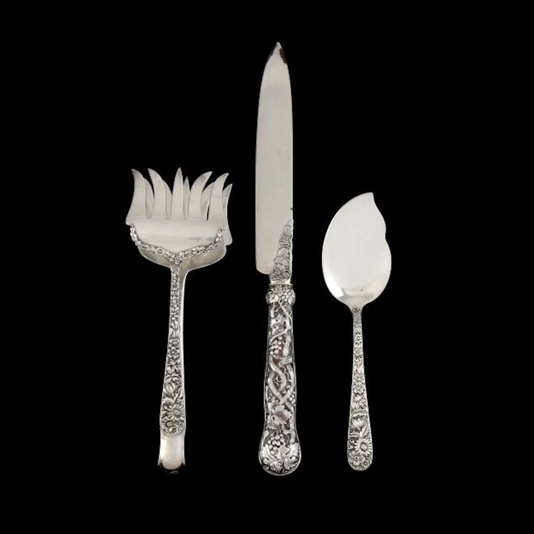 Three Silver Serving Pieces with Relief Decorated Handles