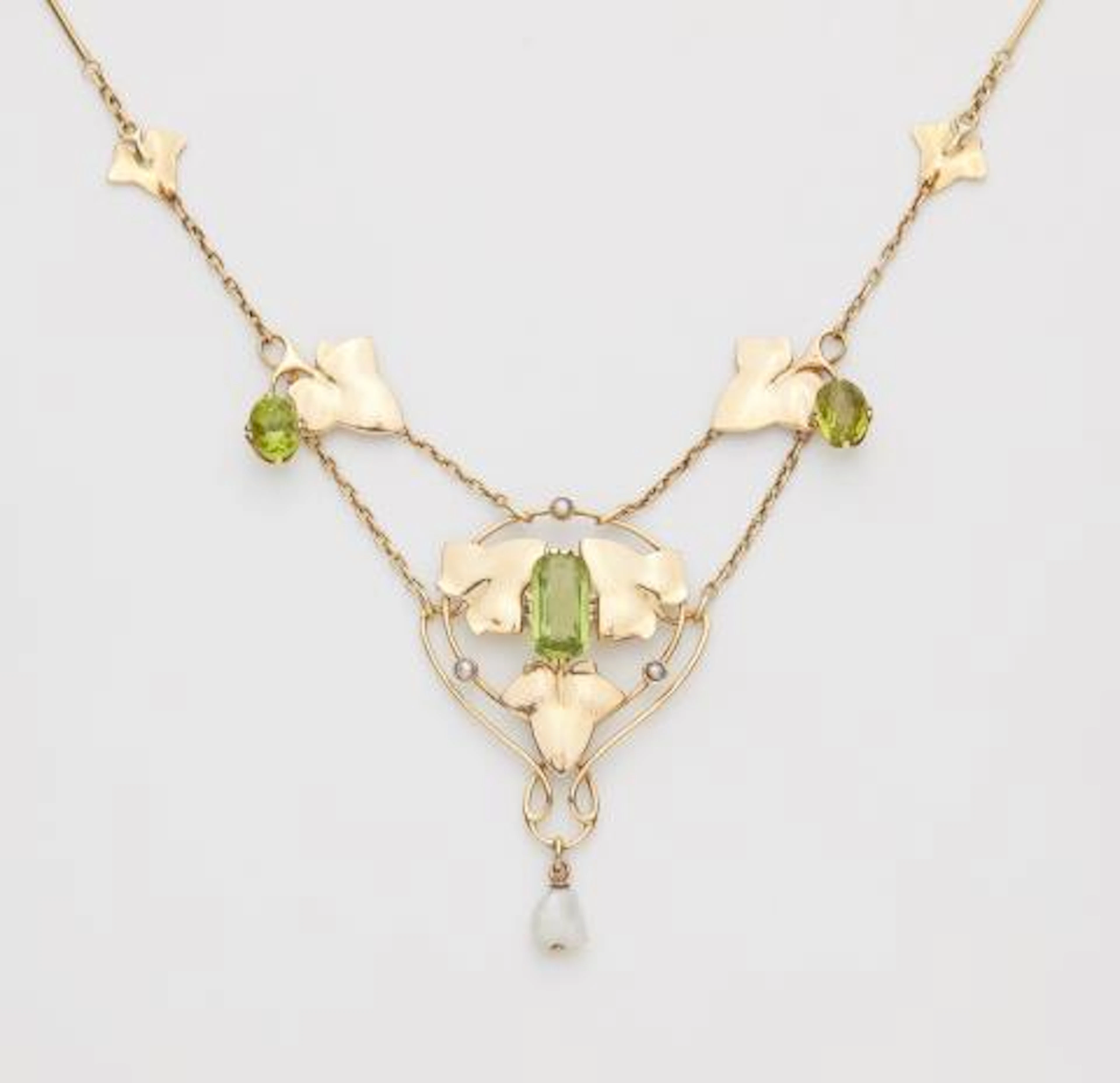 An English 15k gold pearl and peridot Liberty Style Arts & Crafts