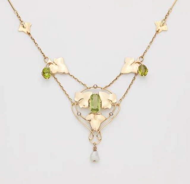 An English 15k gold pearl and peridot Liberty Style Arts & Crafts