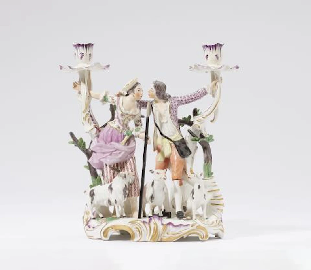 A figural two-flame Höchst porcelain candelabra