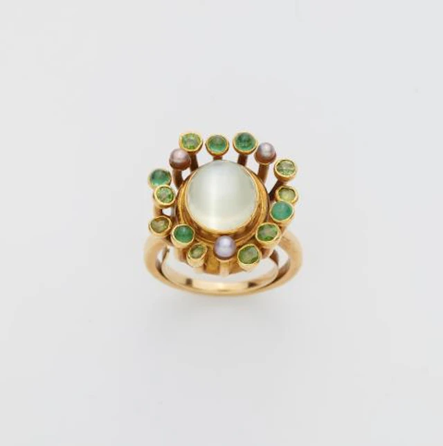 A German 18k yellow gold moonstone peridot emerald and cultured pearl