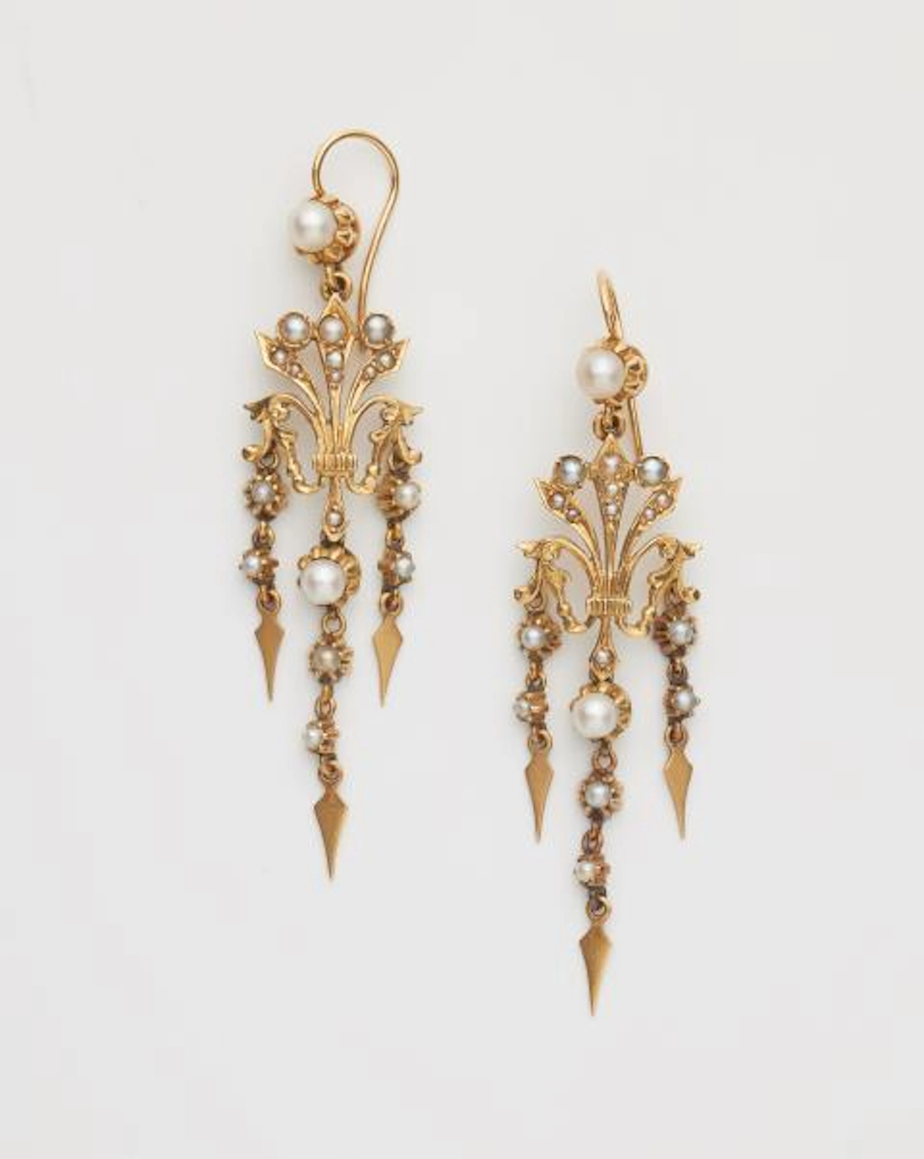 A pair of 18k gold and pearl pendeloque earrings.