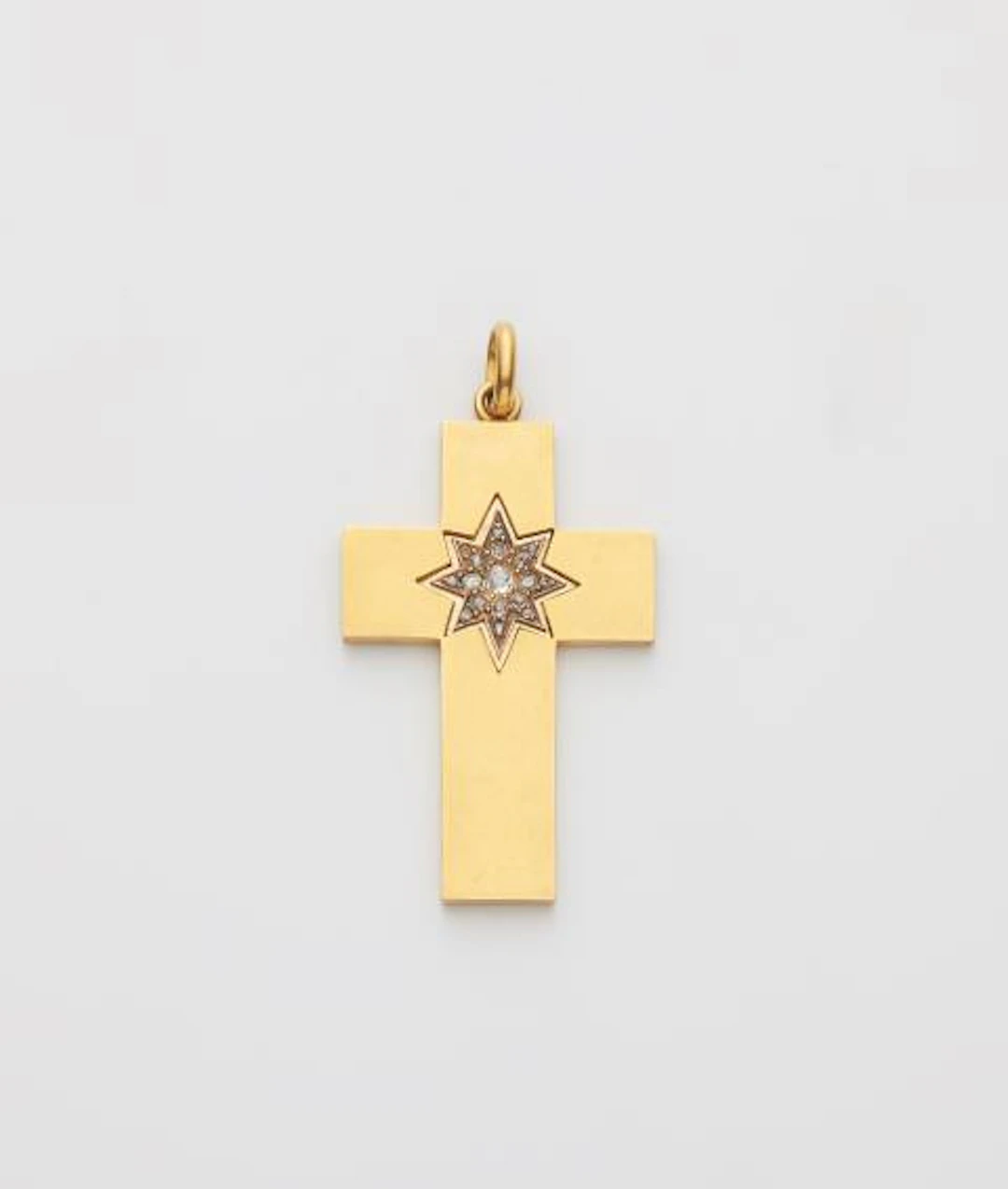 A Victorian 14k gold and diamond cross pendant within it's original case.