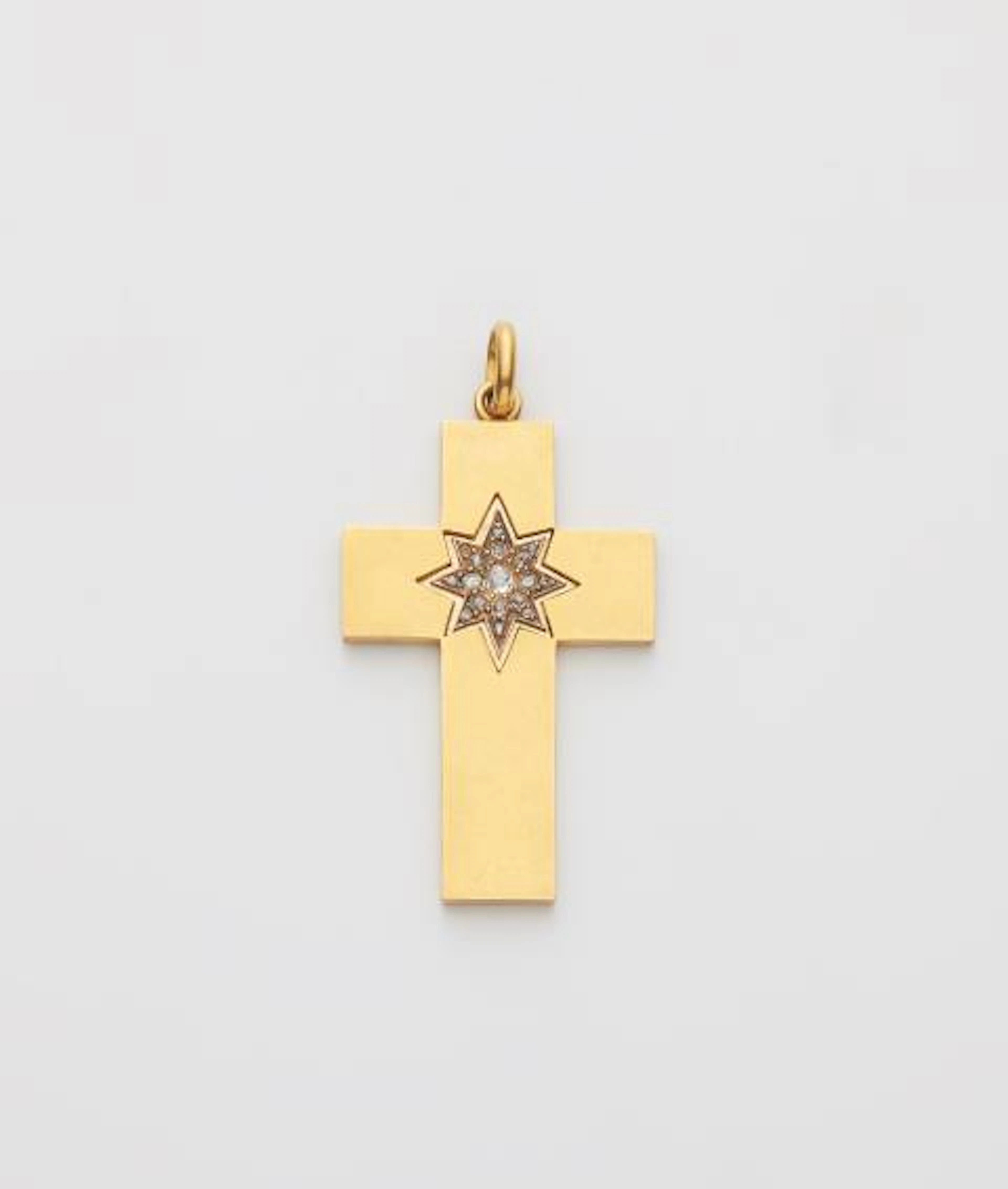 A Victorian 14k gold and diamond cross pendant within it's original case.