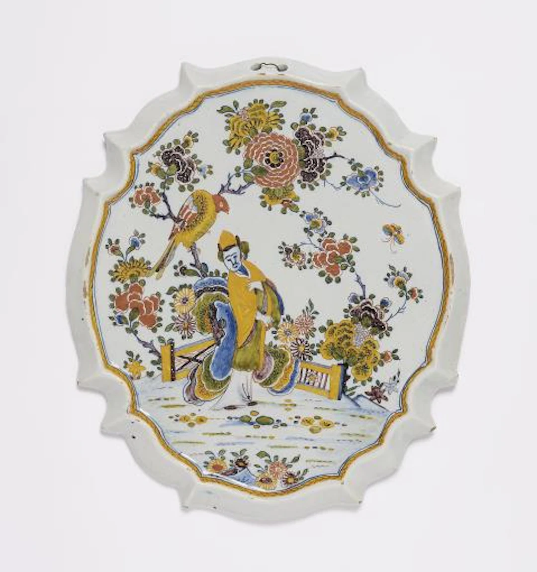 A Dutch Delft plaque with Chinoiserie decor