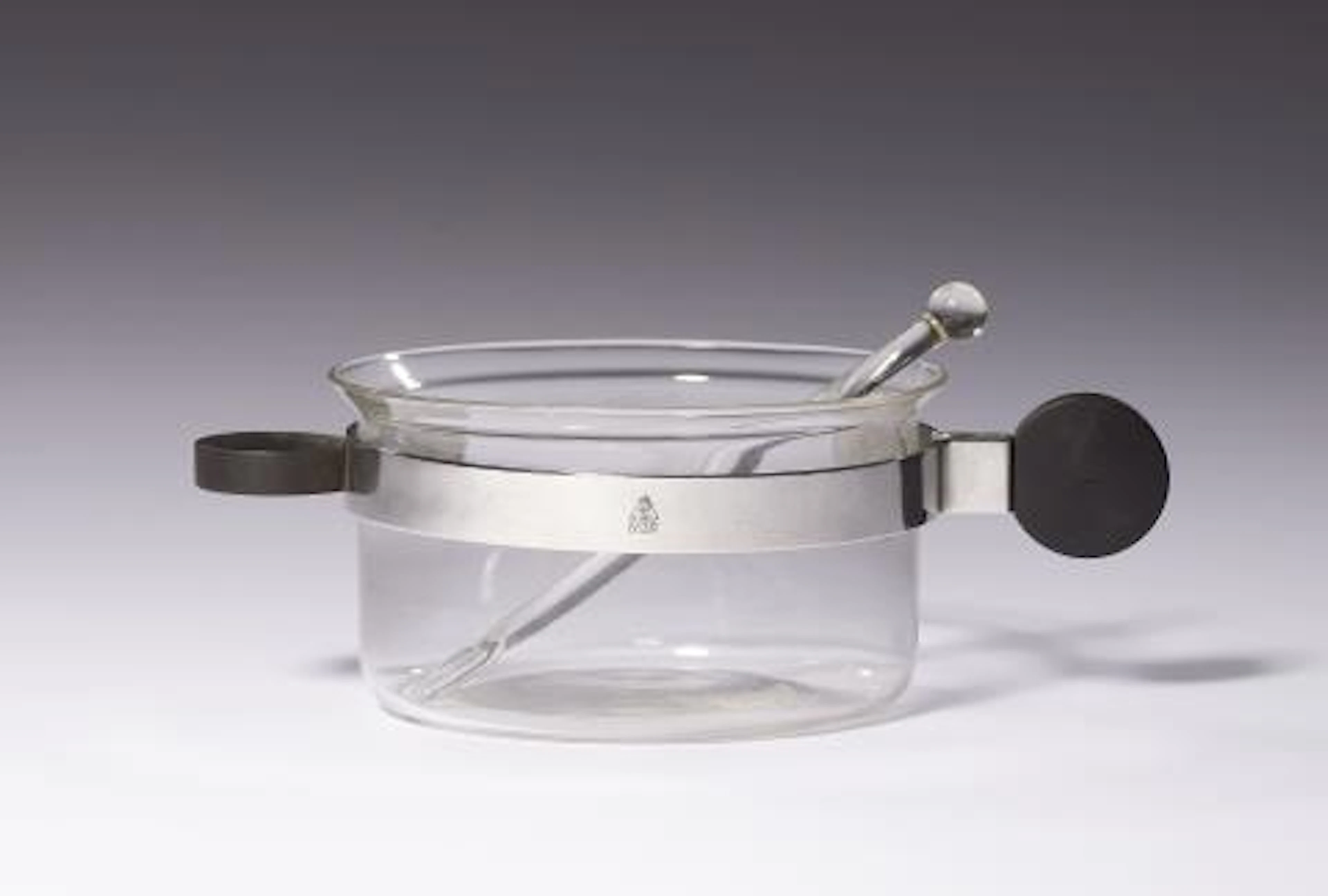 A tea glass and stirrer by Josef Albers (1888 - 1976)