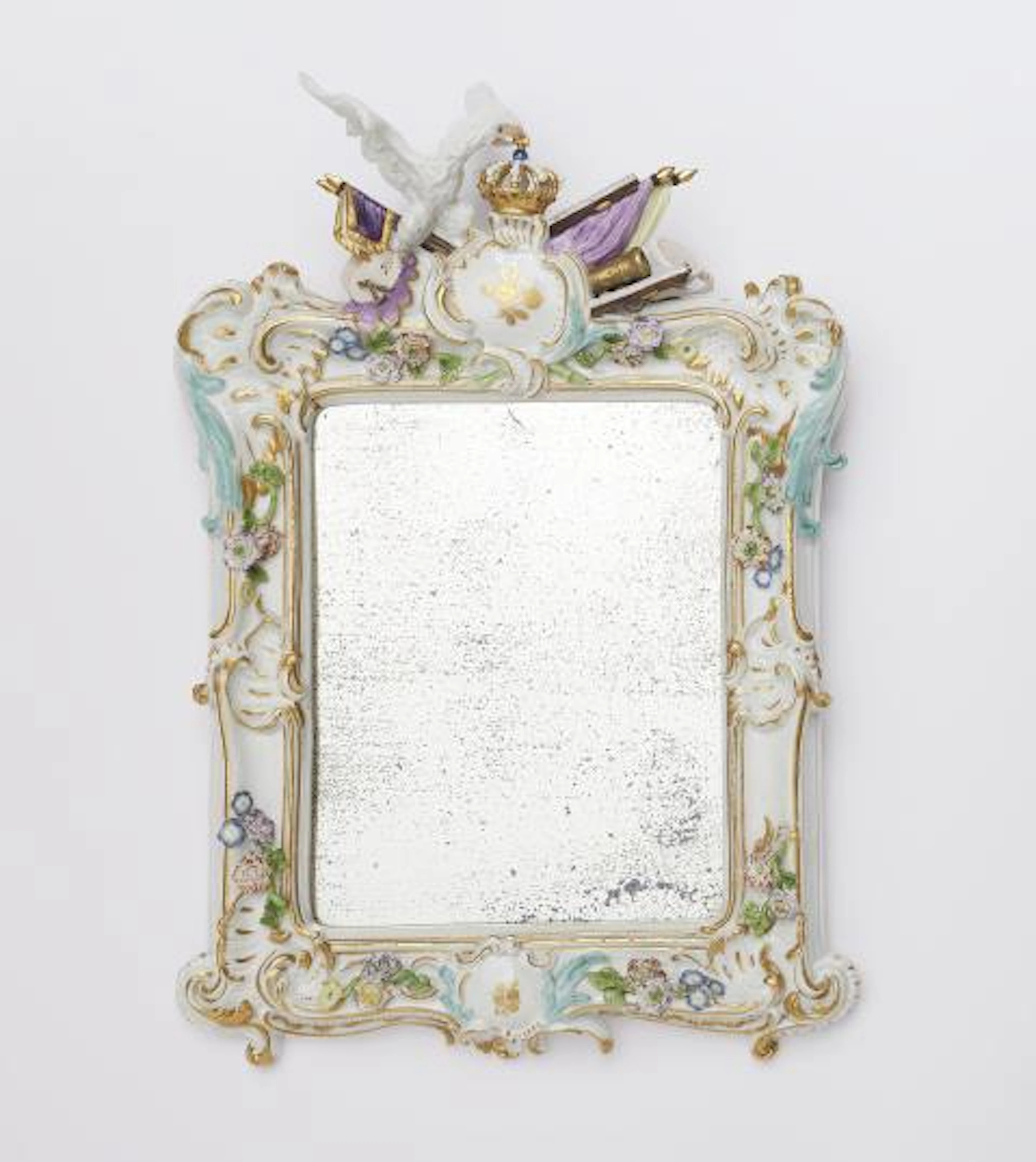 A rare Meissen porcelain frame with a vacant heraldic cartouche