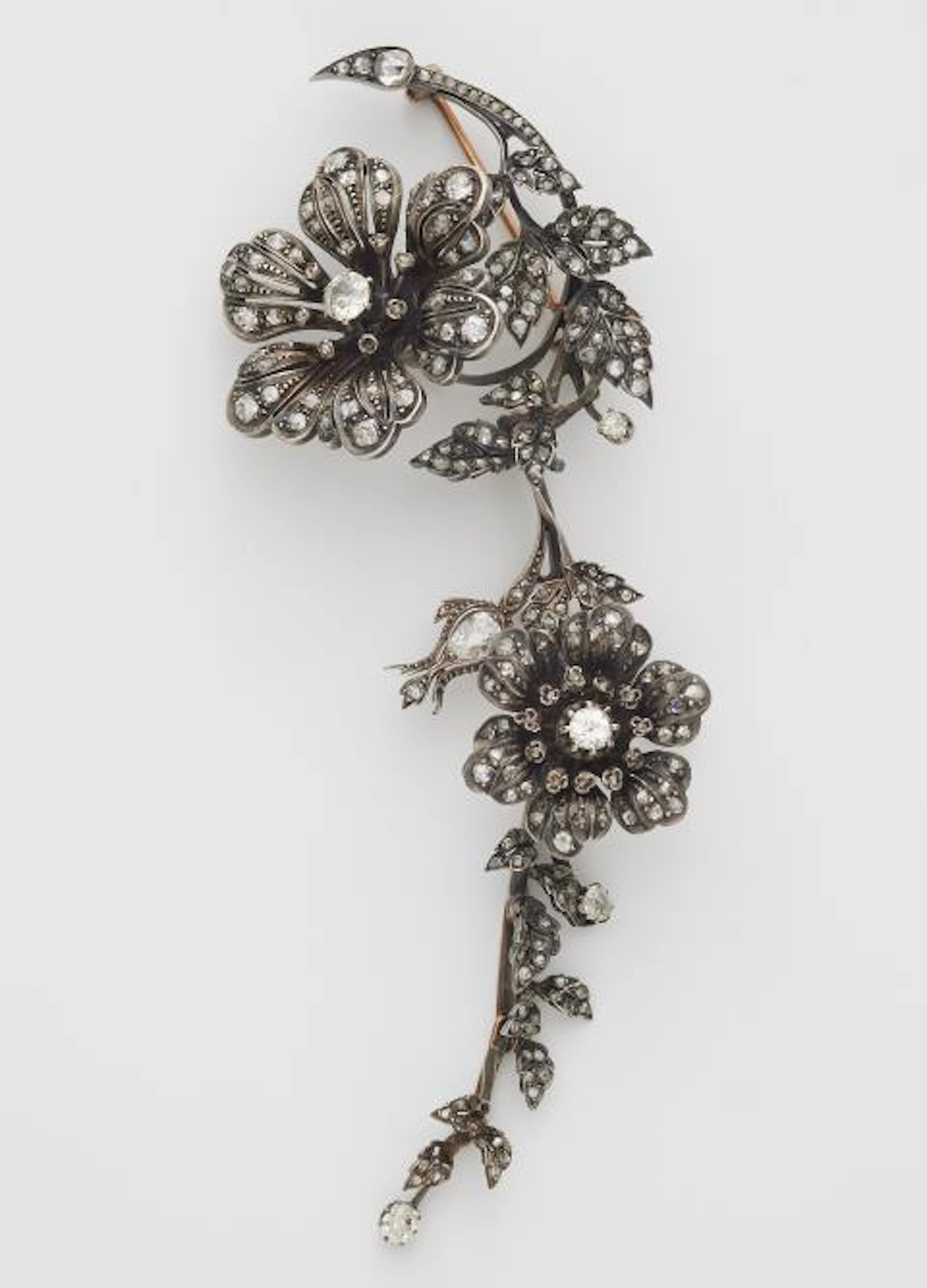 A silver 18k red gold and diamond movable dog rose trendril brooch