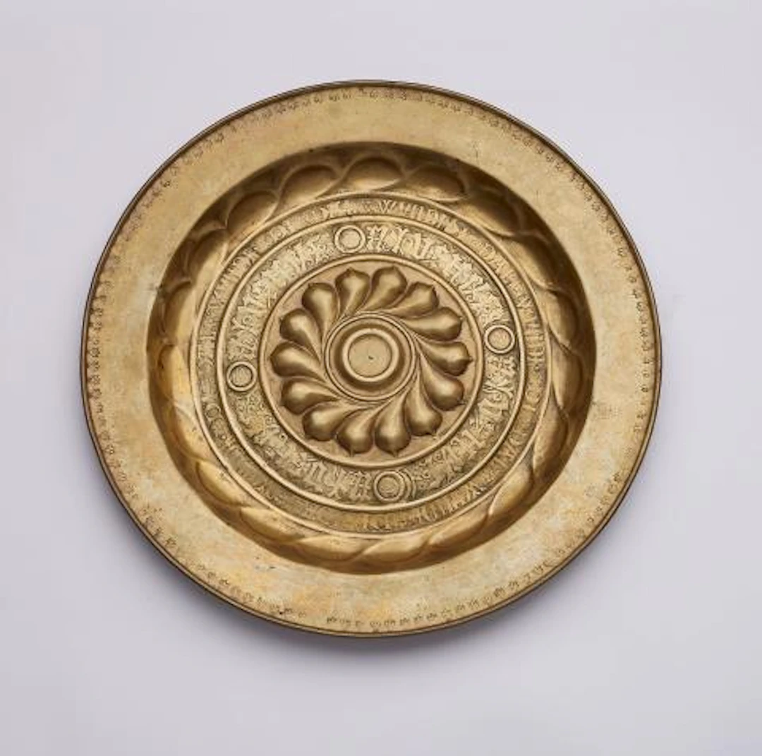 A brass 'Beckenschlägerschüssel' with a tracery rosette