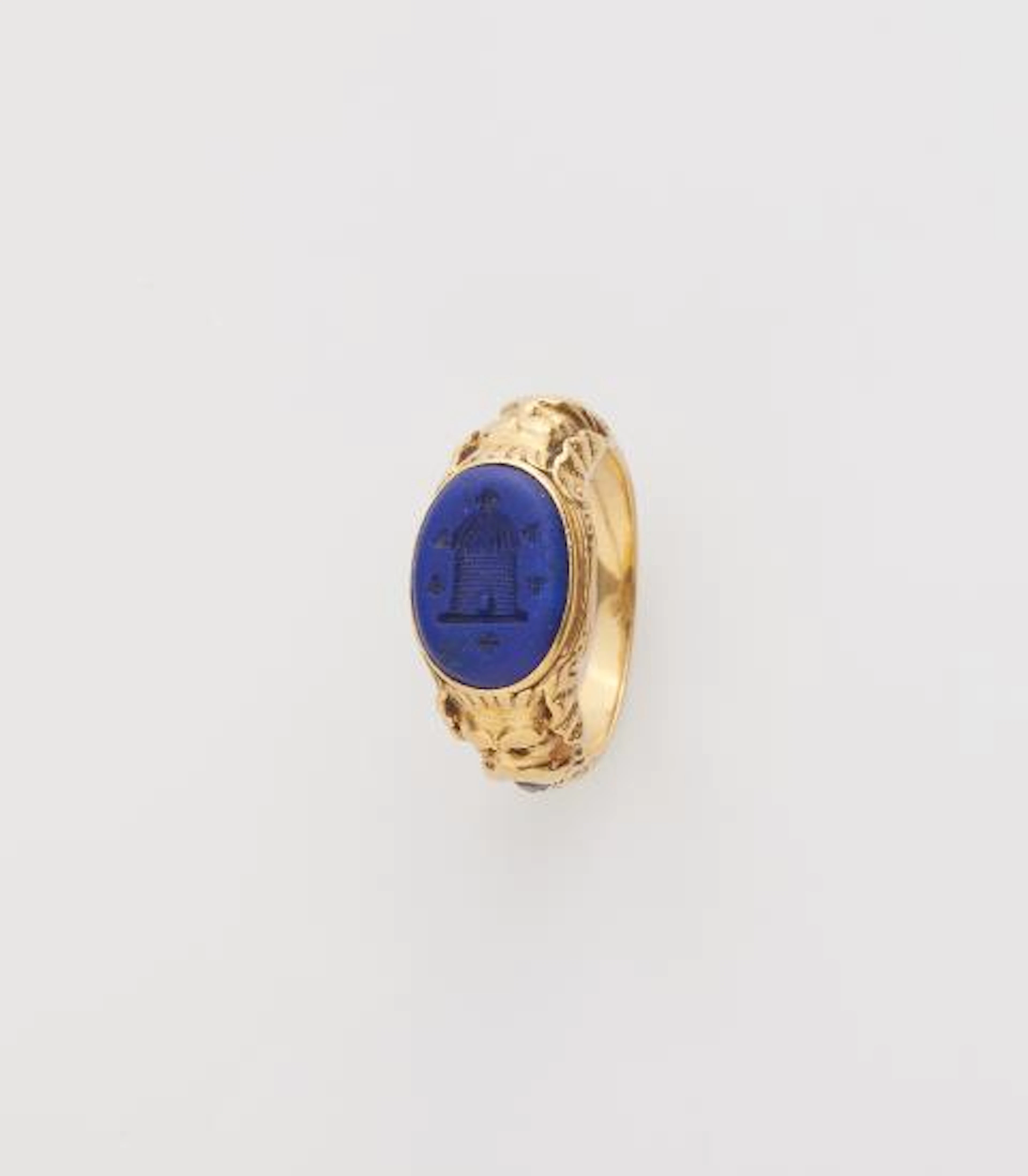 An 18k yellow gold ruby and lapis lazuli intaglio Renaissance Revival