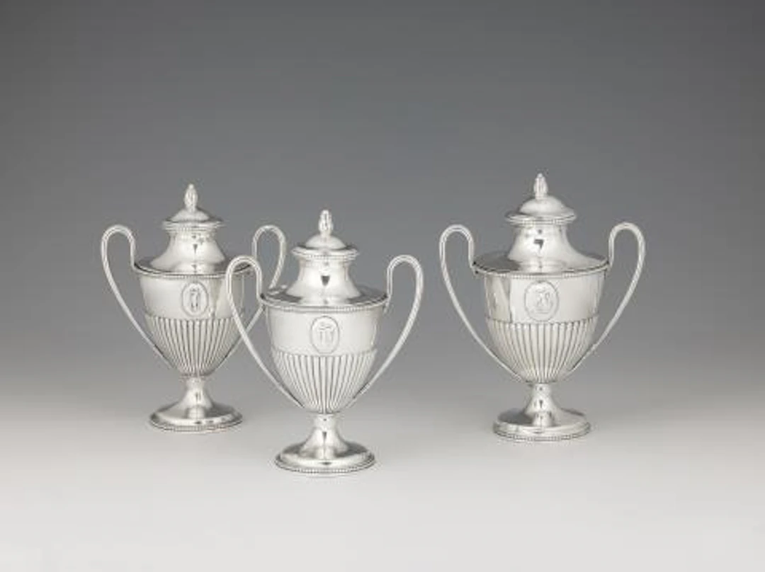 Three George III silver tea caddies