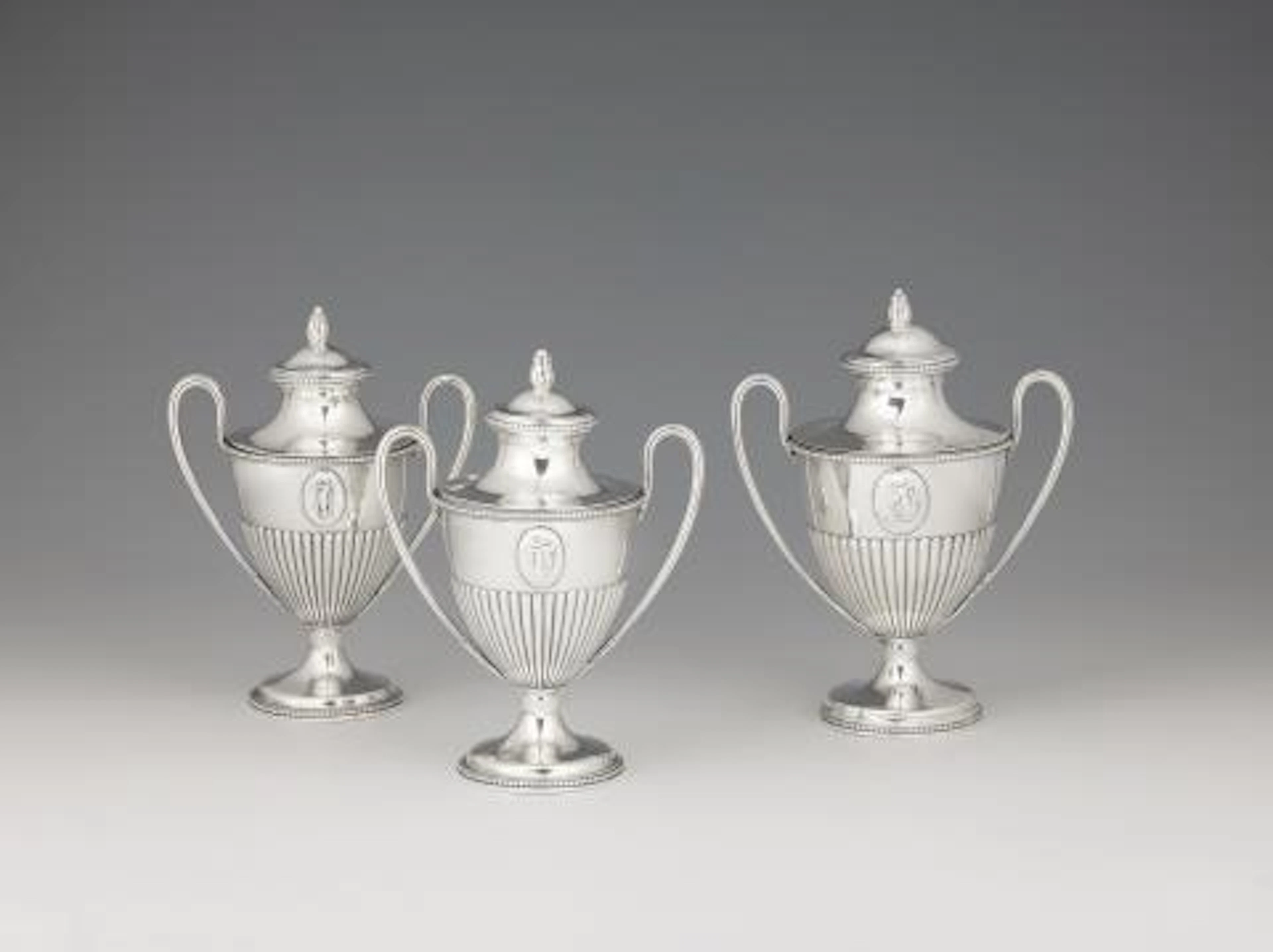 Three George III silver tea caddies