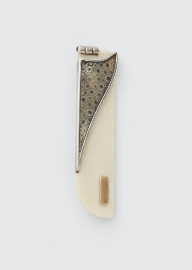 A French silver 18k gold galuchat and ivory Cubist bar brooch.