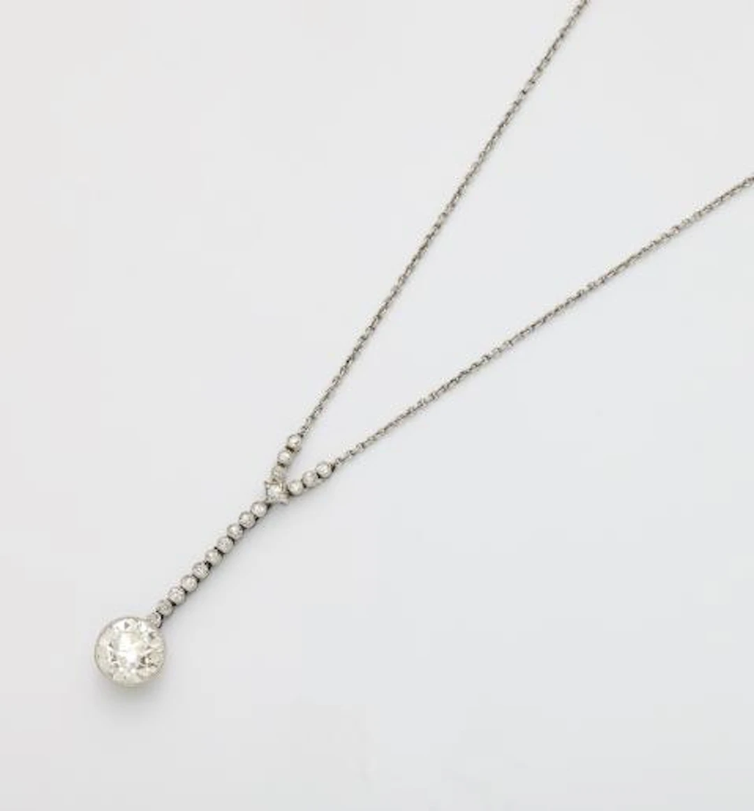 A 14k white gold and diamond Belle Epoque necklace with an European