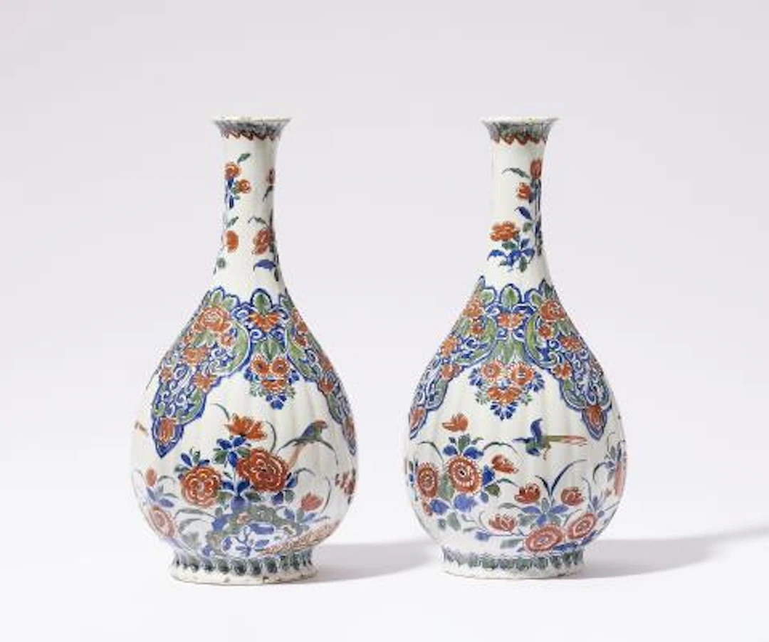 A pair of Dutch Delft faience vases with "Cachemire" decor