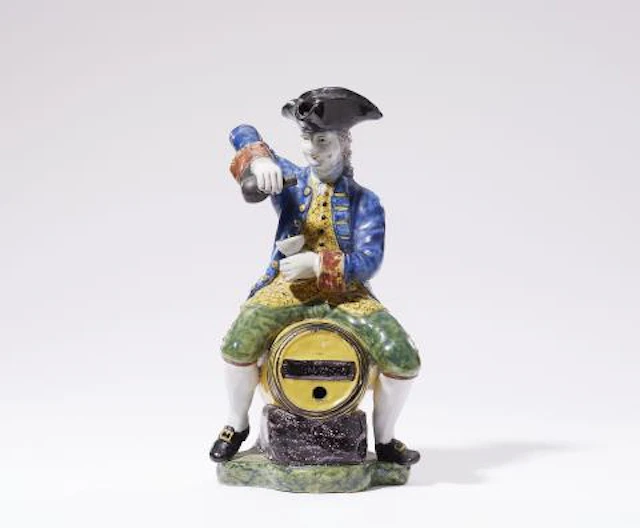A Dutch Delft faience "Man op een ton"