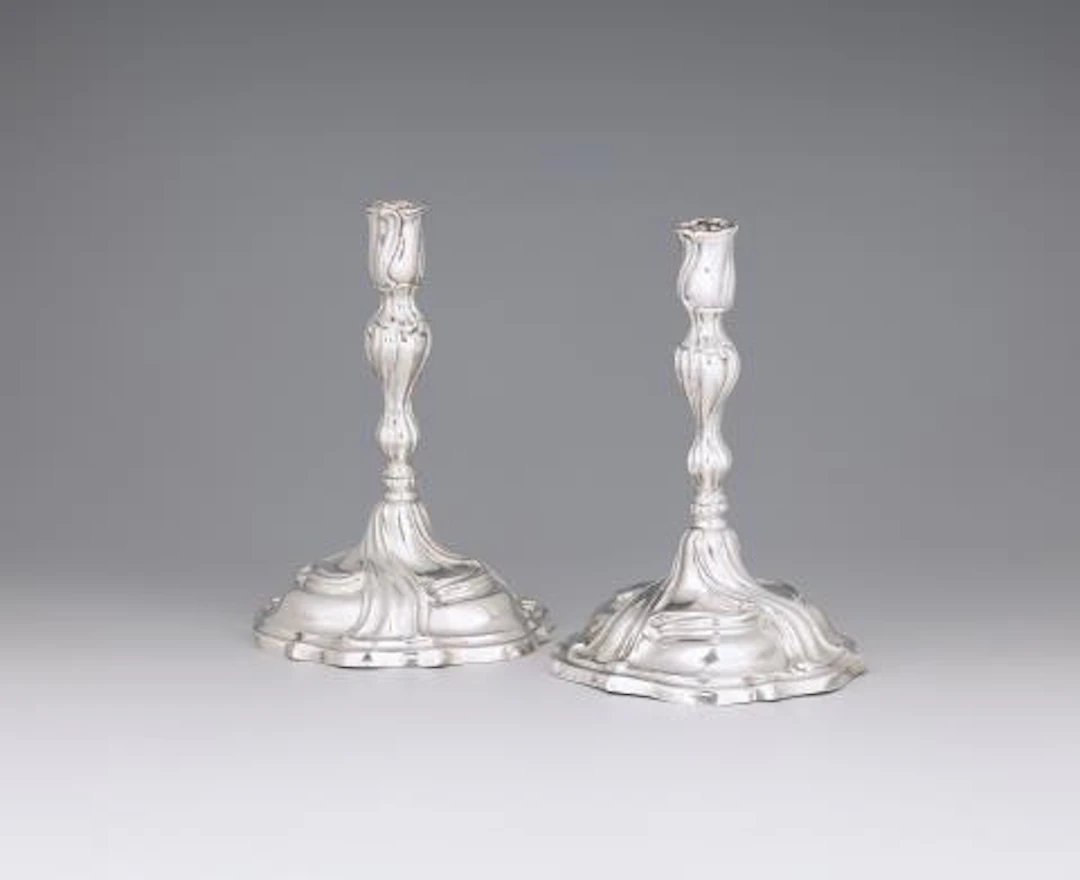 A pair of Augsburg silver candlesticks