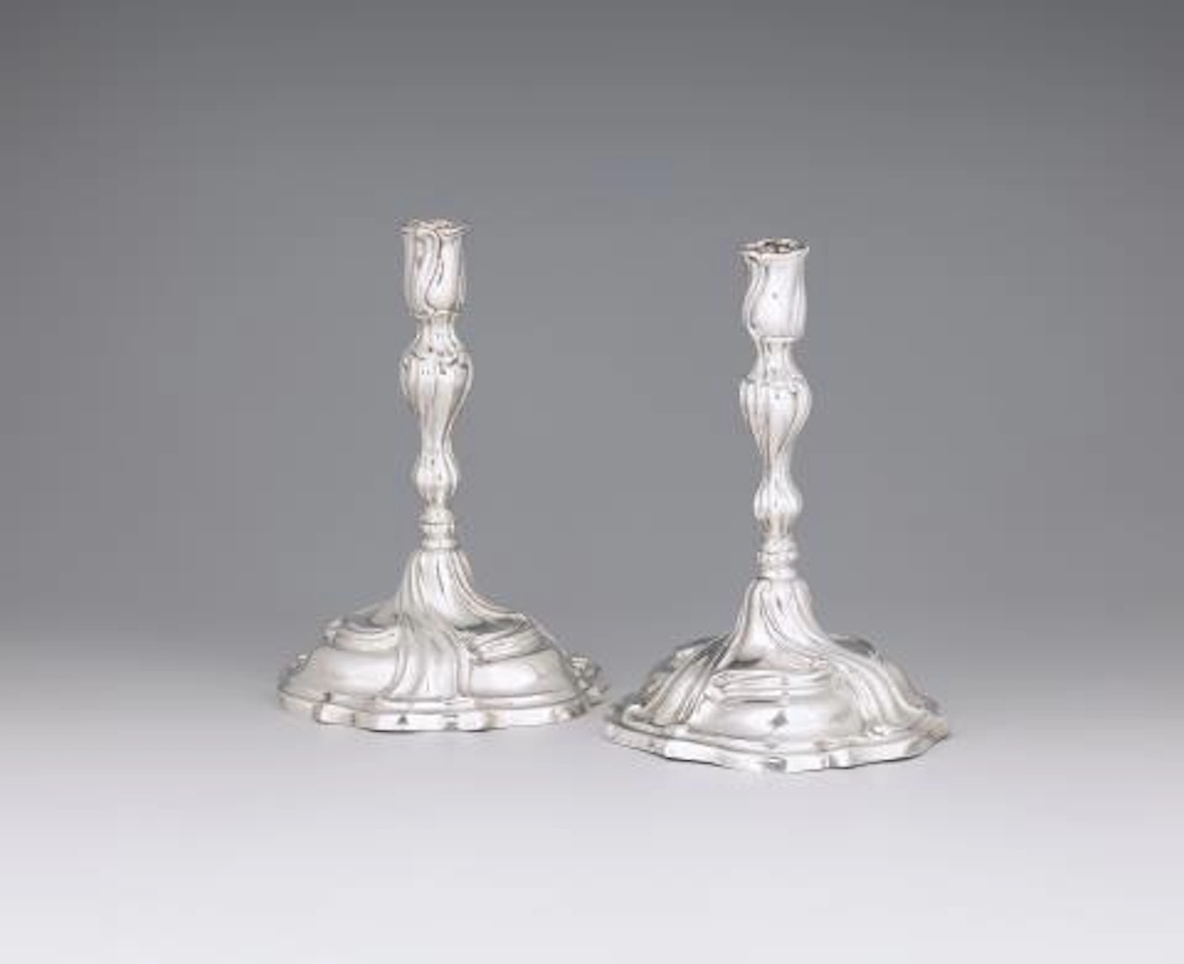 A pair of Augsburg silver candlesticks