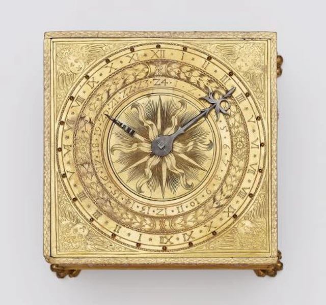 A table clock with continuous relief depicting the story of Adam and Eve