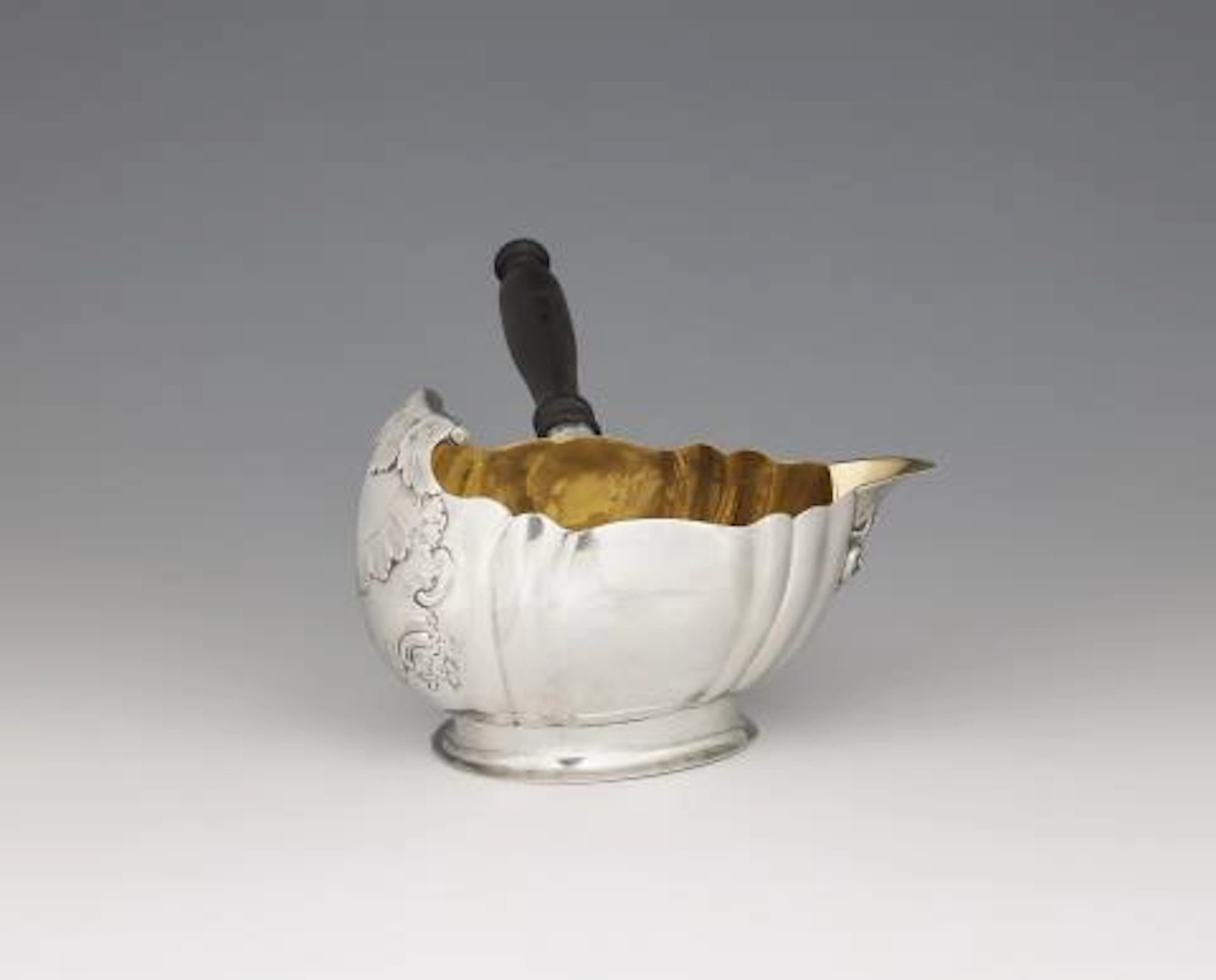 A large Berlin Rococo silver sauce boat
