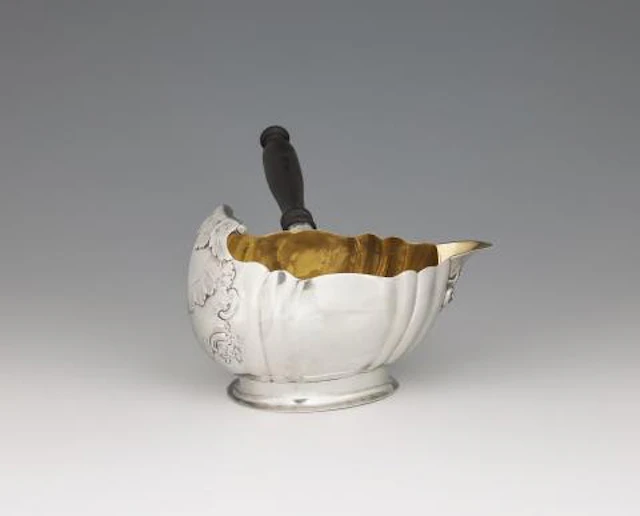 A large Berlin Rococo silver sauce boat