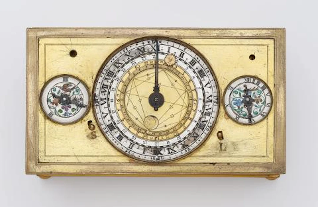 A table clock with an astronomical compendium