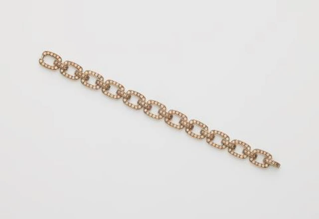 An 18k yellow gold and cognac coloured fancy diamond bracelet.