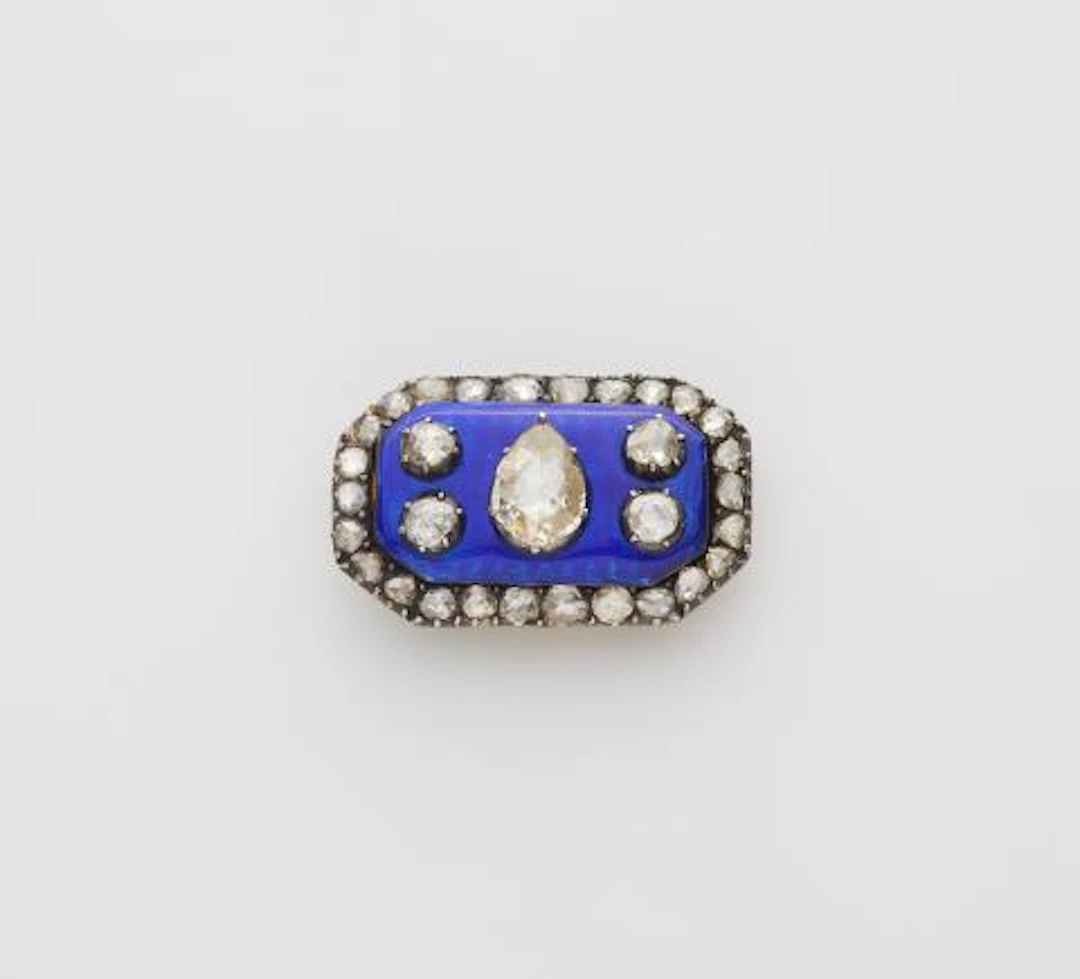 A silver and Royal blue guilloche enamel and foiled rose-cut diamond