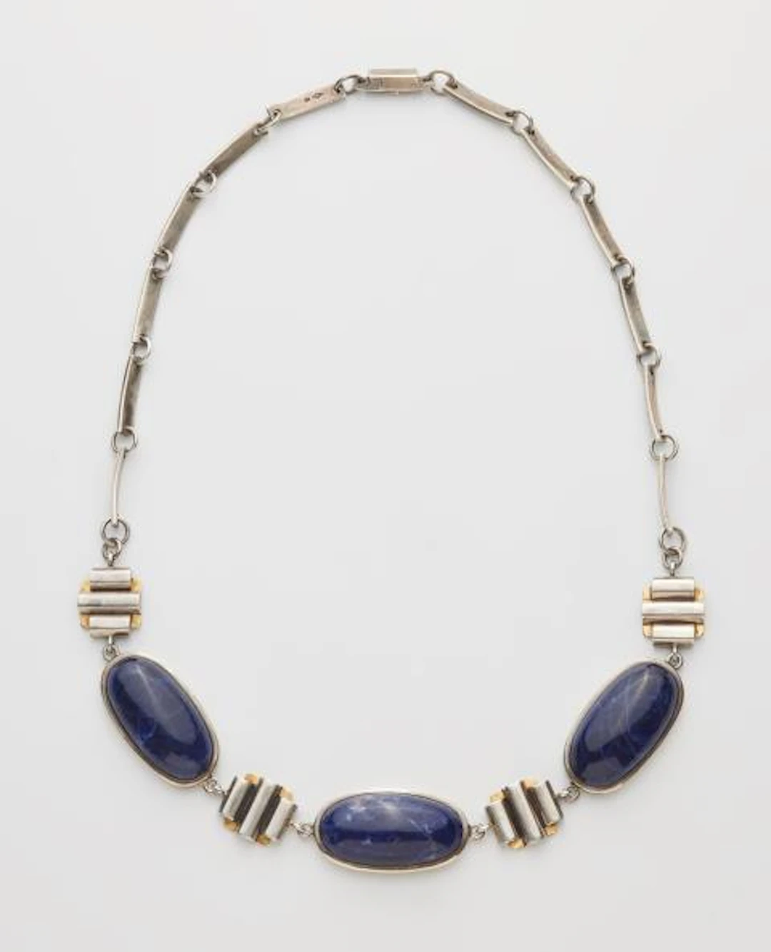 A French silver gold and sodalite cabochon Art Déco necklace.