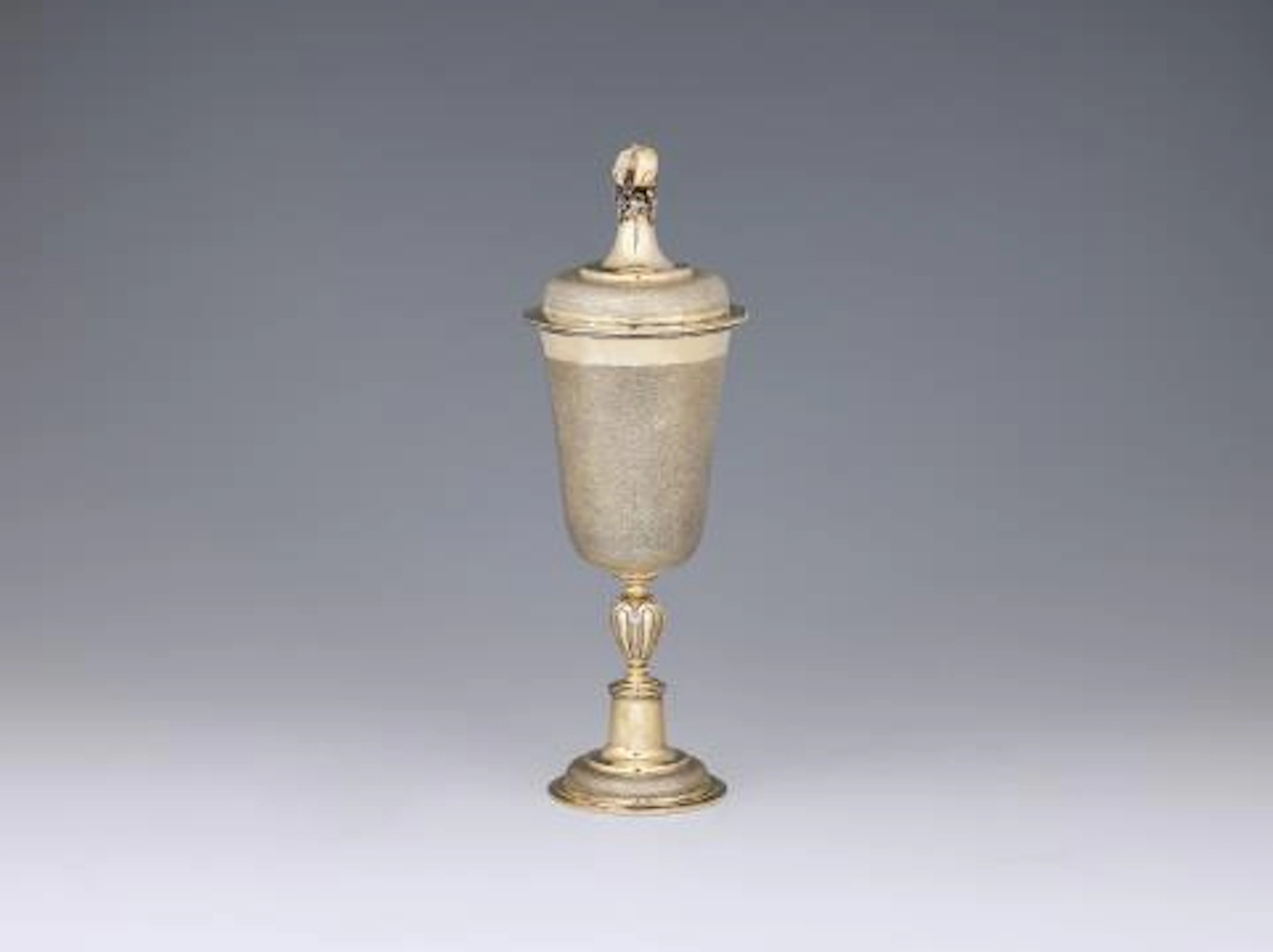 A Baroque parcel-gilt silver goblet and cover with snakeskin decor