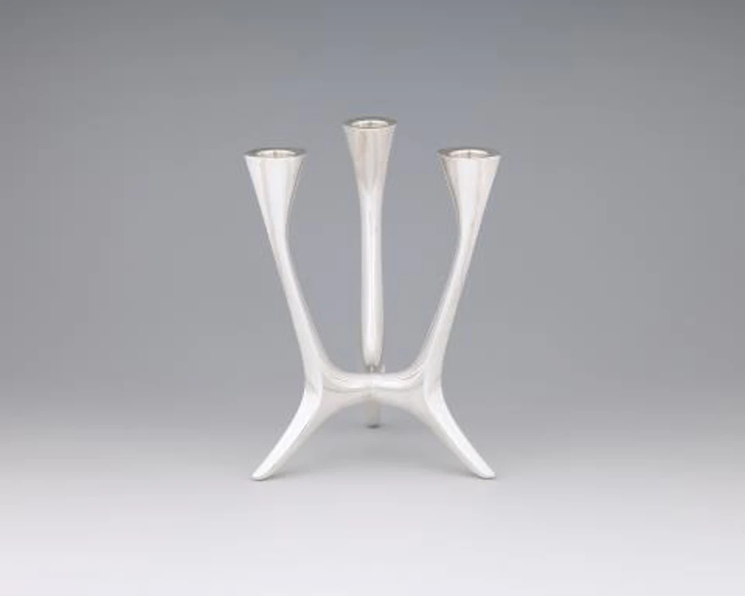 A mid-century silver candlestick