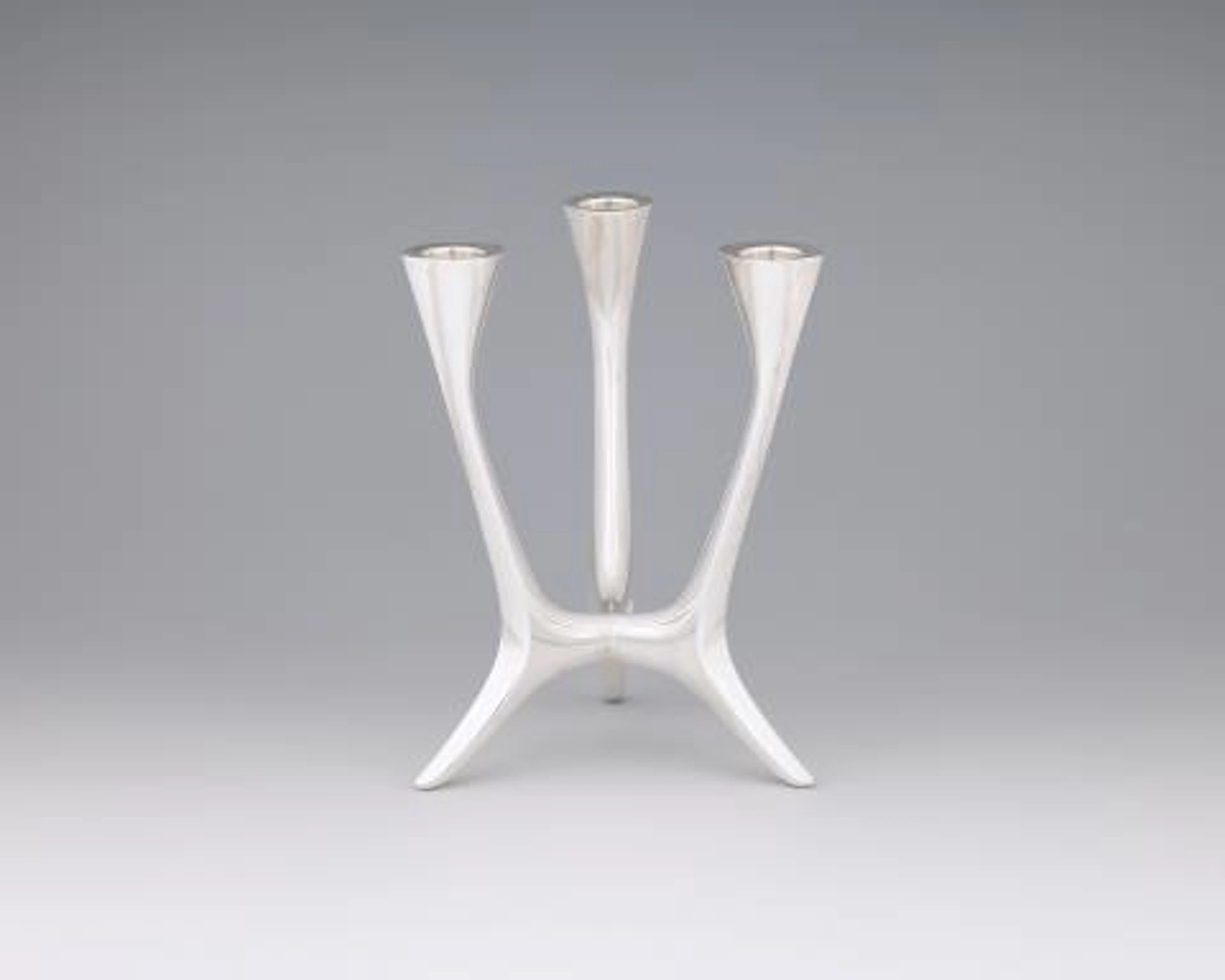A mid-century silver candlestick