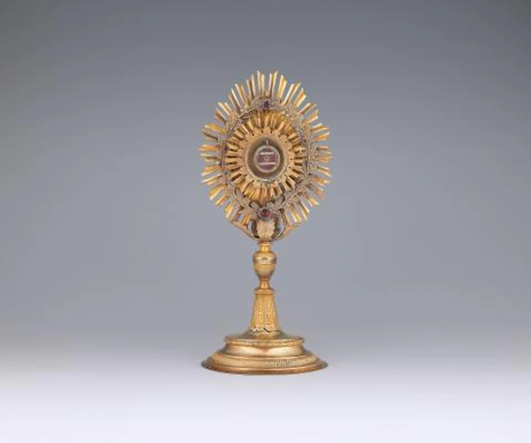A classicist brass reliquary