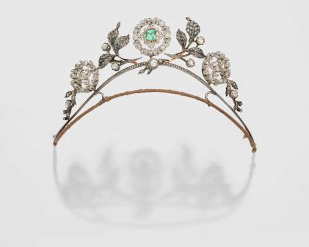 A 14k gold silver diamond and emerald Belle Epoque tiara.
