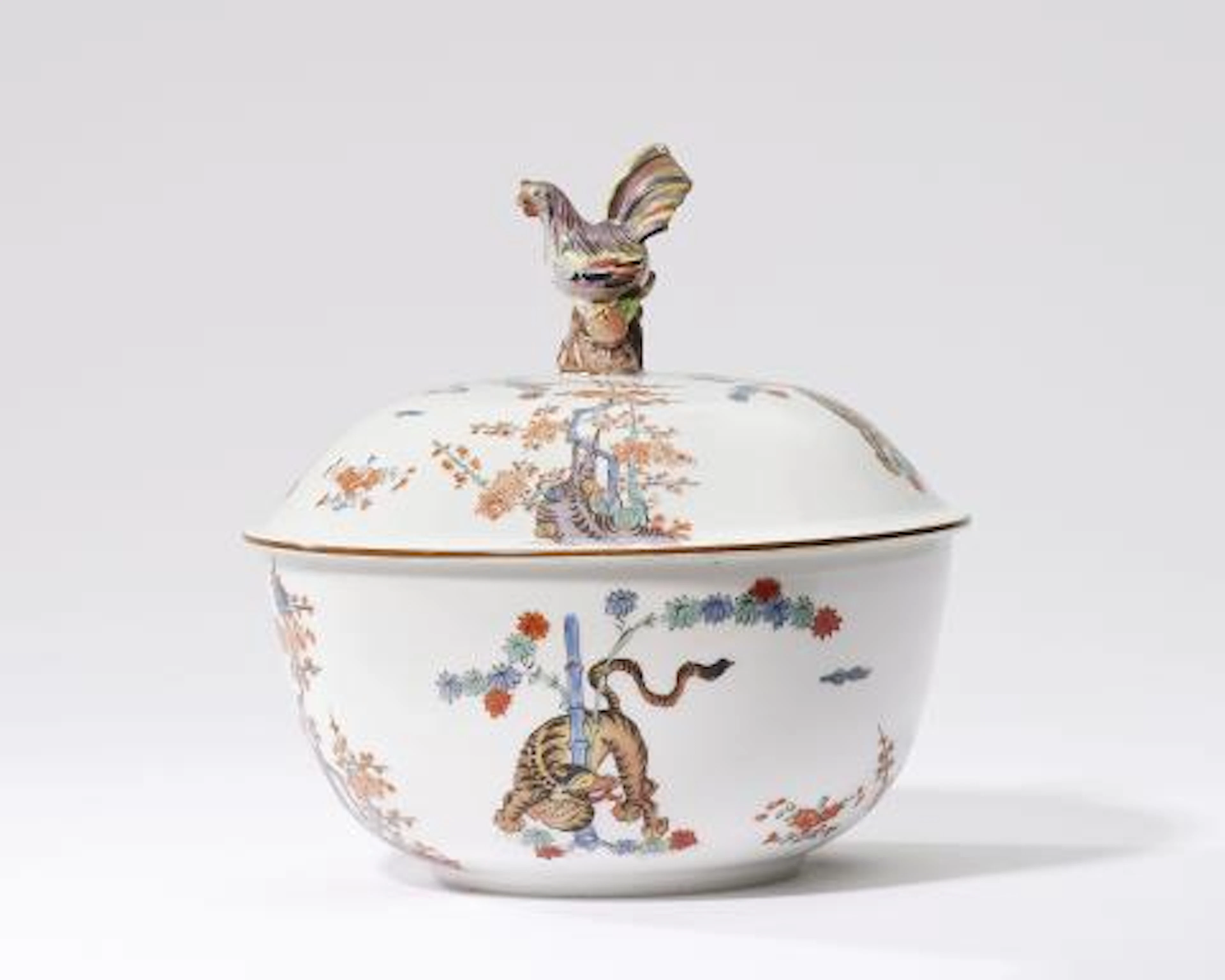 A Meissen porcelain bowl and cover from a service with "Yellow Lion" decor