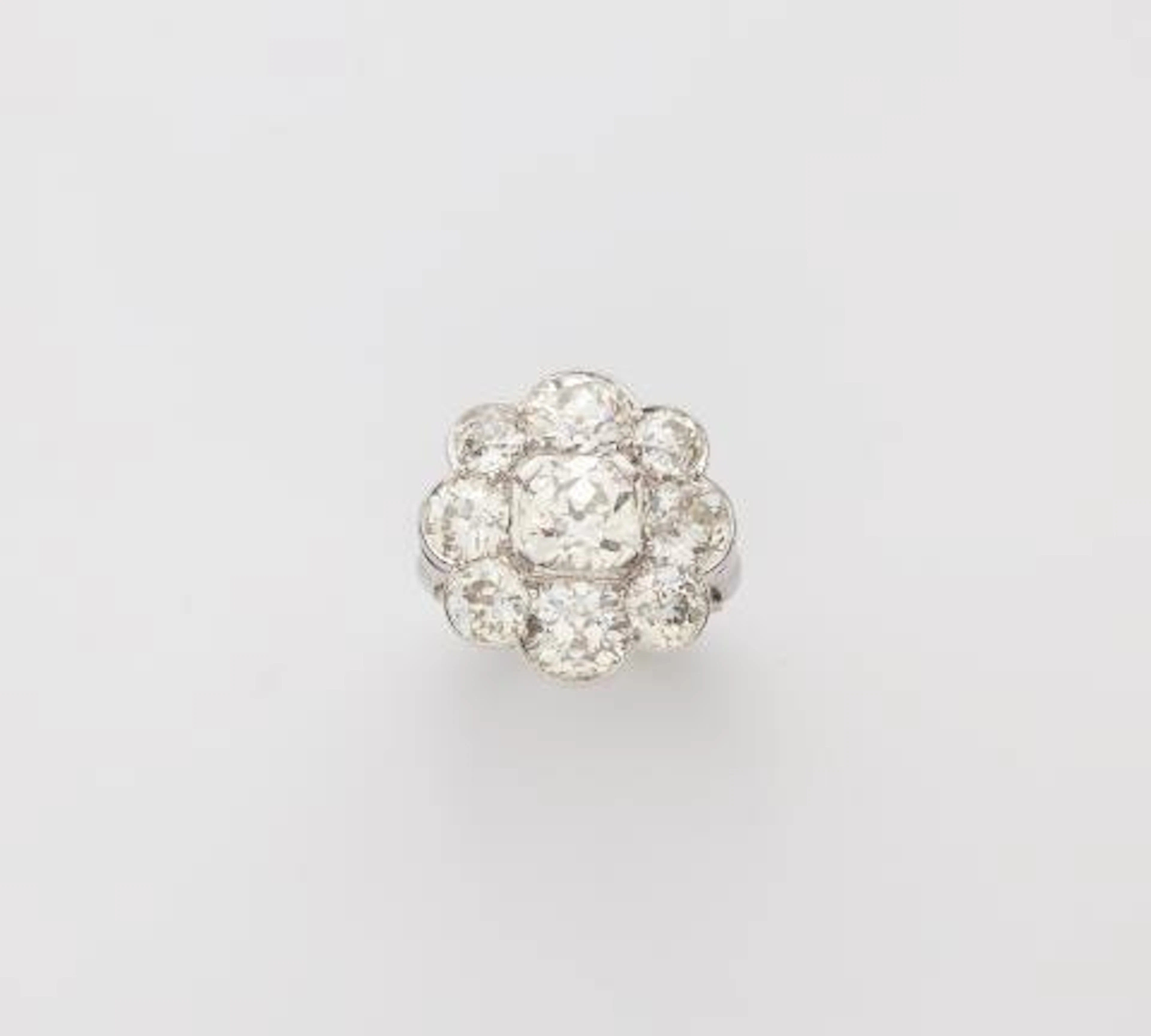 A platinum and diamond Belle Epoque Style cluster ring.
